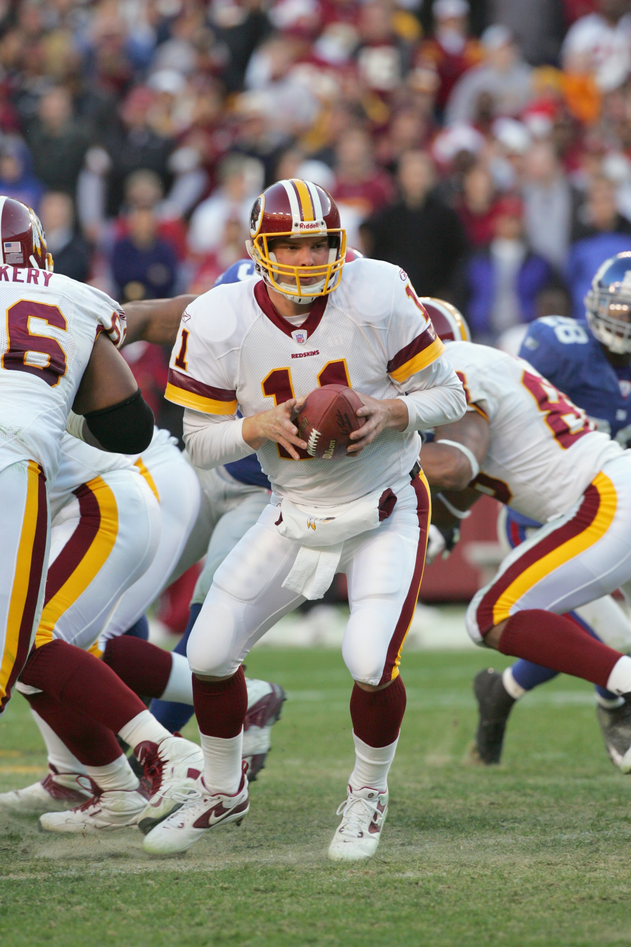 LANDOVER, MD - DECEMBER 24:  Quarterback Patrick Ramsey #11 of the Washington Redskins looks to hand off against the New York Giants at FedExField on December 24, 2005 in Landover, Maryland. The Redskins defeated the Giants 35-10. (Photo by Jim McIsaac/Ge