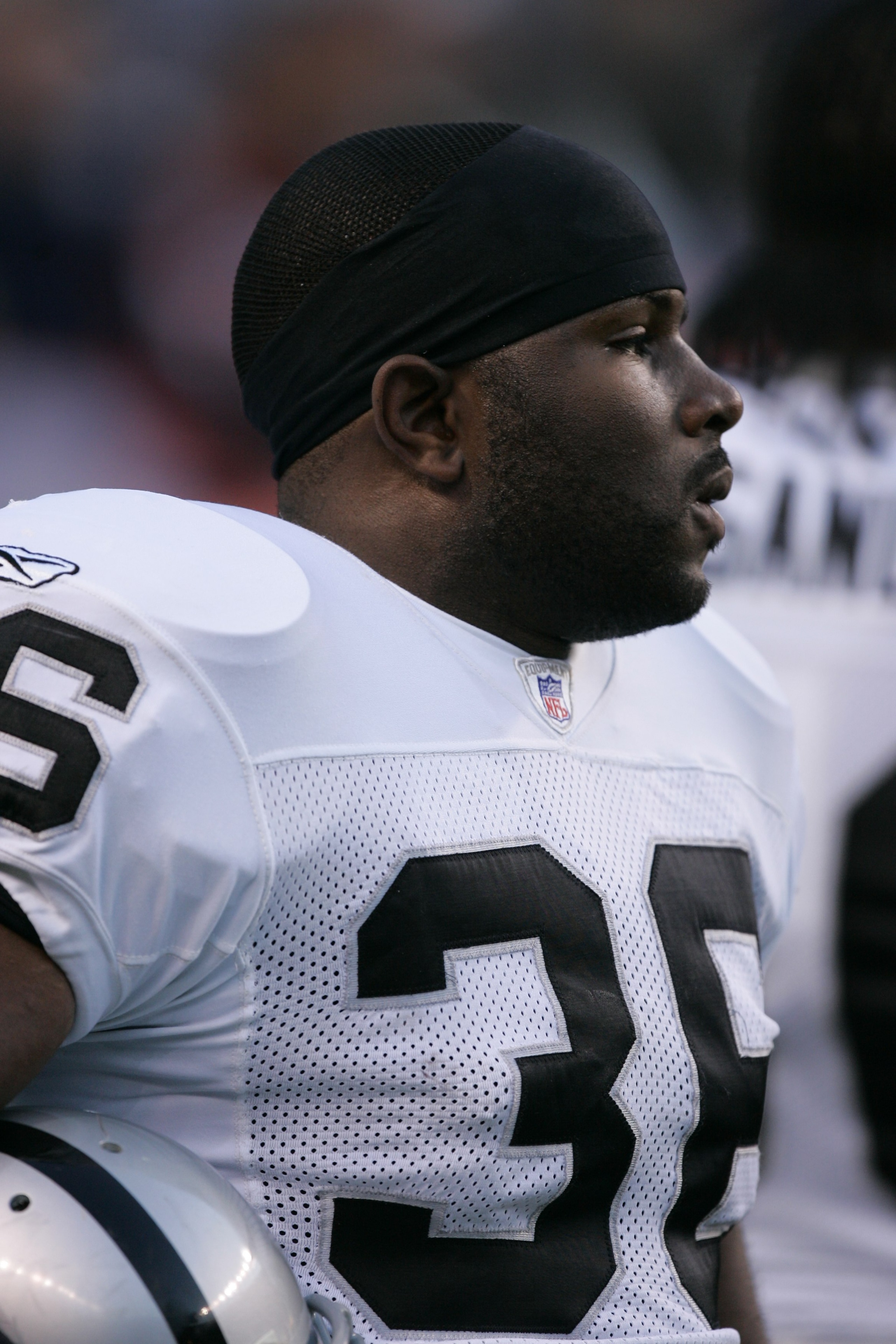 DENVER - OCTOBER 15:  Safety Derrick Gibson #36 of the Oakland Raiders looks on against the Denver Broncos on October 15, 2006 at Invesco Field at Mile High in Denver, Colorado.  The Broncos won 13-3. (Photo by Brian Bahr/Getty Images)