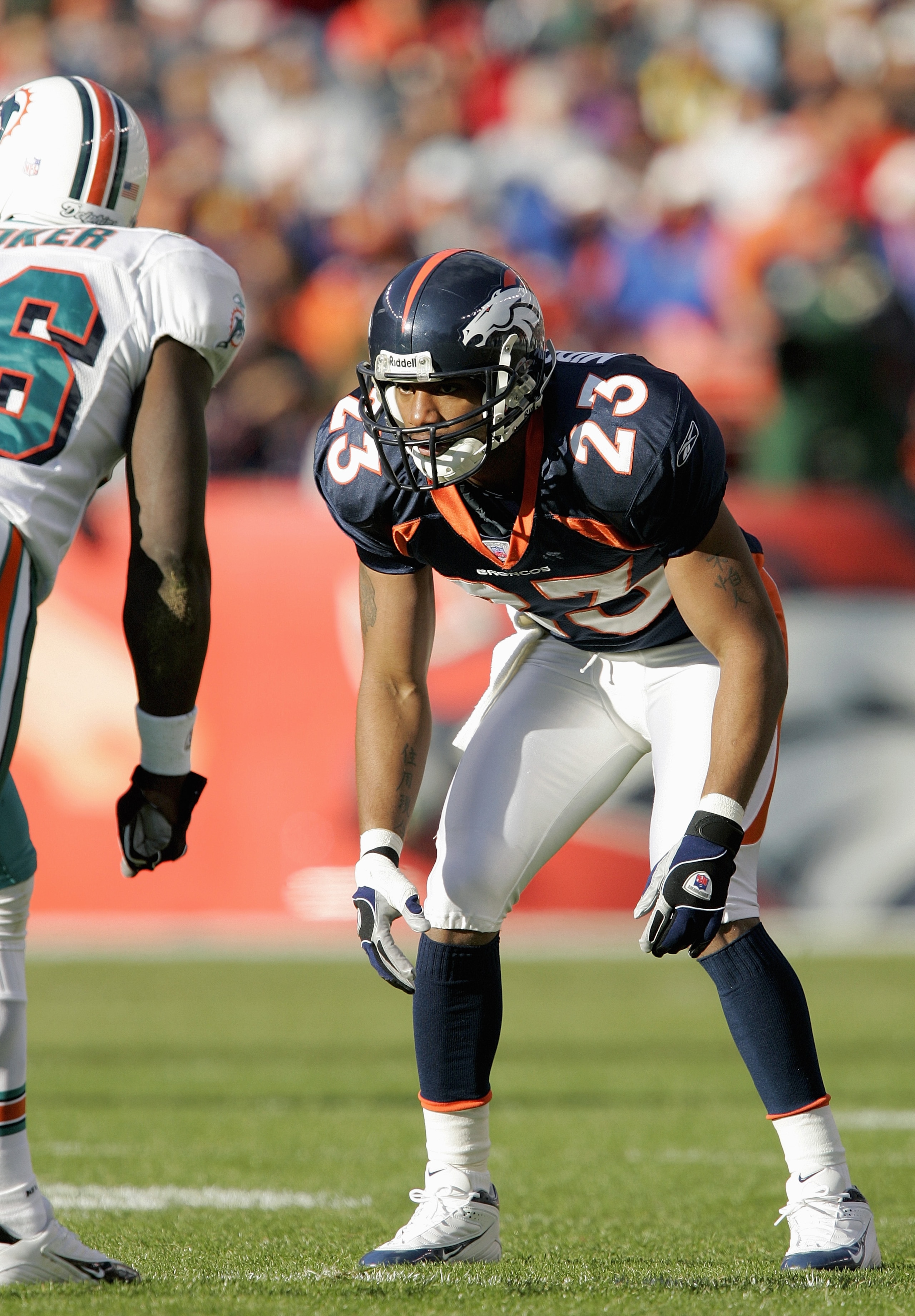 DENVER - DECEMBER 12:  Willie Middlebrooks #23 of the Denver Broncos gets into position during the game against the Miami Dolphins on December 12, 2004 at Invesco Field at Mile High Stadium in Denver, Colorado.  The Broncos won 20-17.  (Photo by Brian Bah