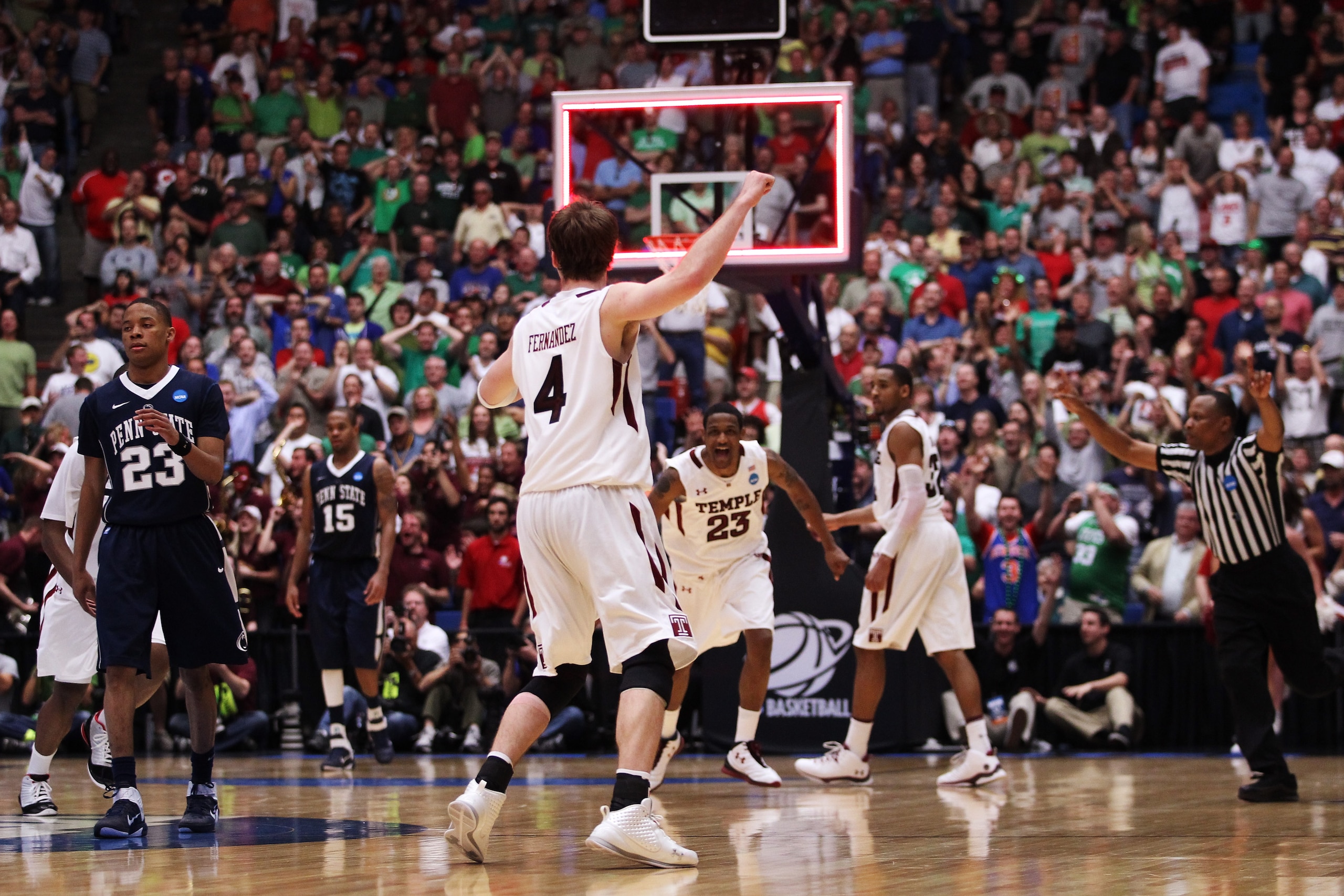 TUCSON, AZ - MARCH 17:  Juan Fernandez #4 of the Temple Owls celebrates after he scored the winning basket to defeat the Penn State Nittany Lions 66 to 64 in the second round of the 2011 NCAA men's basketball tournament at McKale Center on March 17, 2011