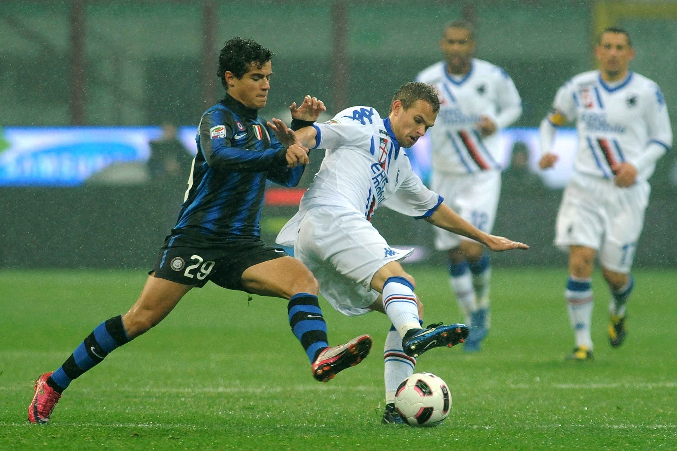 MILAN, ITALY - OCTOBER 24:  Correia Philippe Coutinho of FC Internazionale Milano is challenged by Vladimir Koman of UC Sampdoria during the Serie A match between FC Internazionale Milano and UC Sampdoria at Stadio Giuseppe Meazza on October 24, 2010 in M