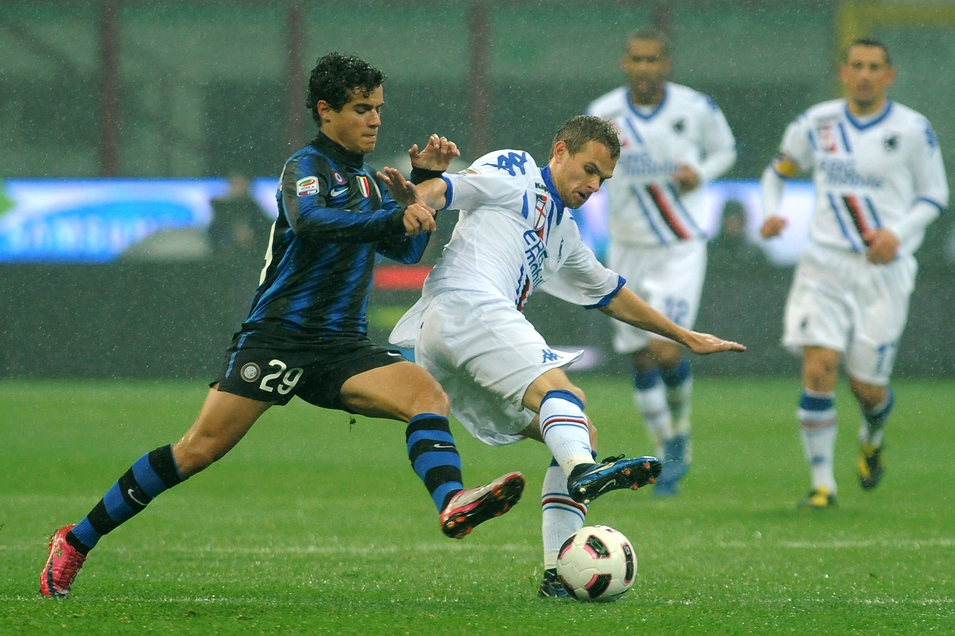MILAN, ITALY - OCTOBER 24:  Correia Philippe Coutinho of FC Internazionale Milano is challenged by Vladimir Koman of UC Sampdoria during the Serie A match between FC Internazionale Milano and UC Sampdoria at Stadio Giuseppe Meazza on October 24, 2010 in M