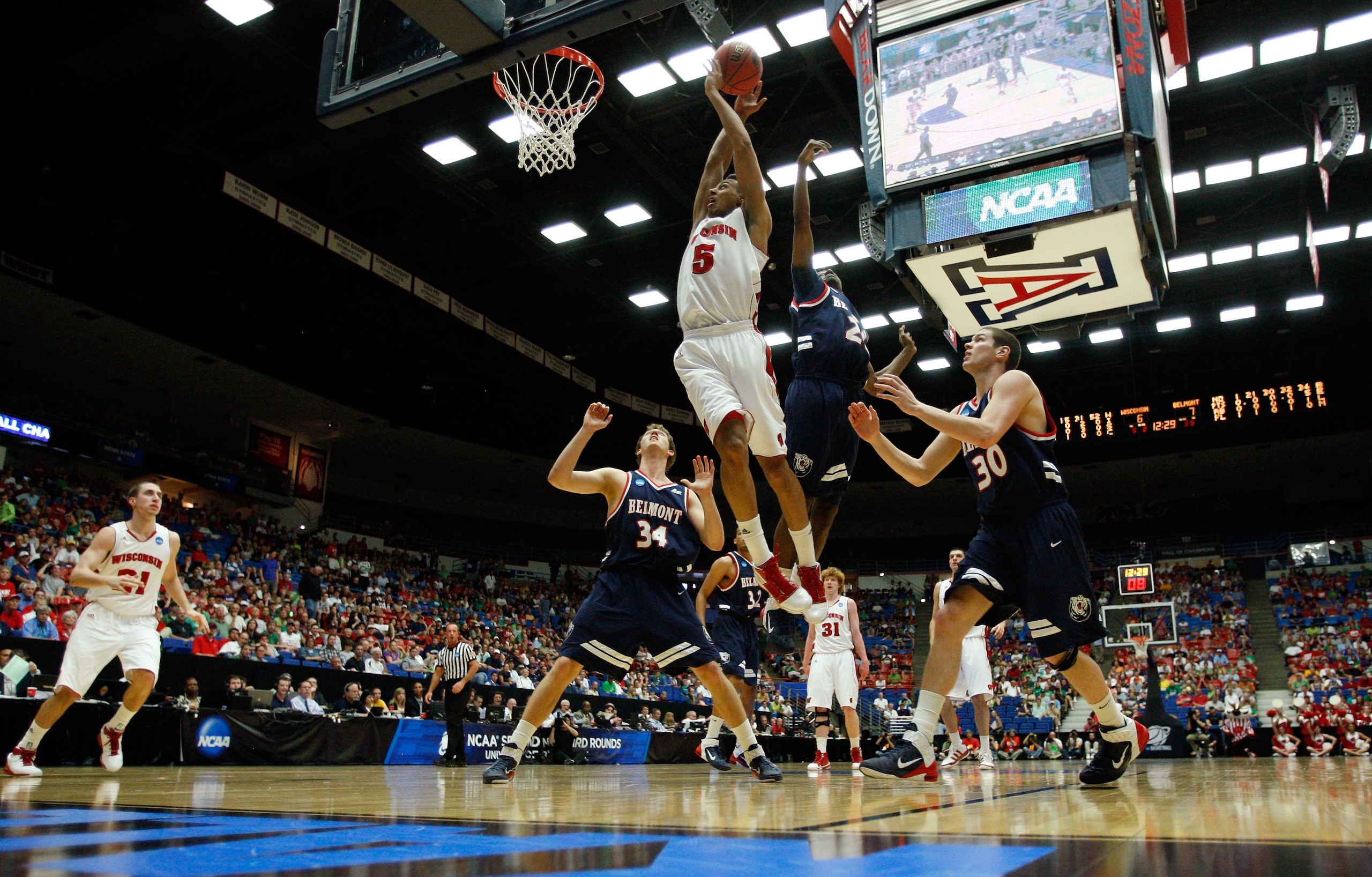 TUCSON, AZ - MARCH 17: Ryan Evans #5 of the Wisconsin Badgers shoots against the Belmont Bruins during the second round of the 2011 NCAA men's basketball tournament at McKale Center on March 17, 2011 in Tucson, Arizona. (Photo by Harry How/Getty Images) TUCSON, AZ - MARCH 17: Ryan Evans #5 of the Wisconsin Badgers shoots against the Belmont Bruins during the second round of the 2011 NCAA men's basketball tournament at McKale Center on March 17, 2011 in Tucson, Arizona. (Photo by Harry How/Getty Images)
