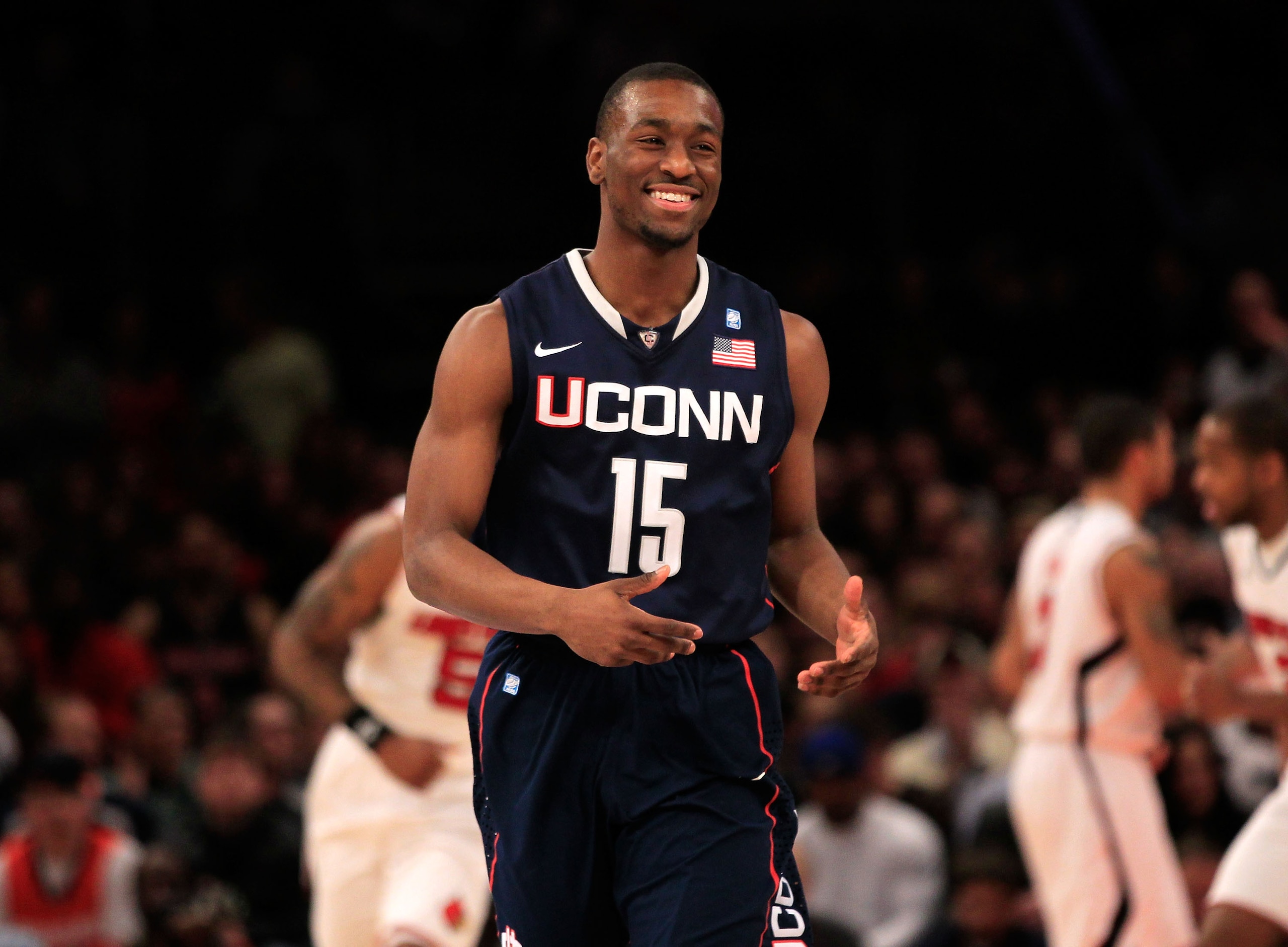 NEW YORK, NY - MARCH 12:  Kemba Walker #15 of the Connecticut Huskies reacts after a play against the Louisville Cardinals during the championship of the 2011 Big East Men's Basketball Tournament presented by American Eagle Outfitters at Madison Square Ga