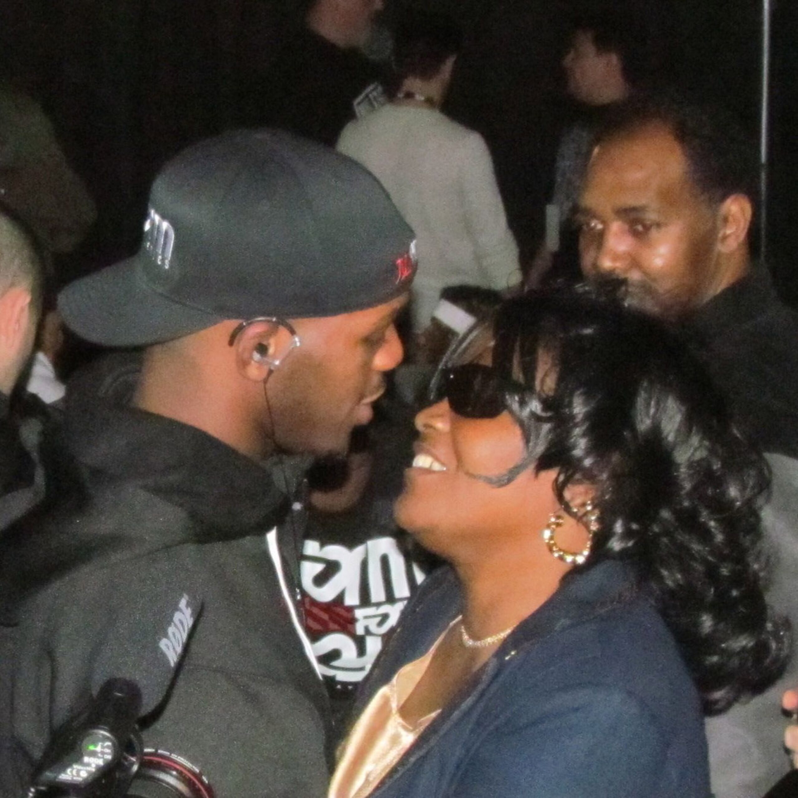 Jon Jones greeting his parents before the weigh-in