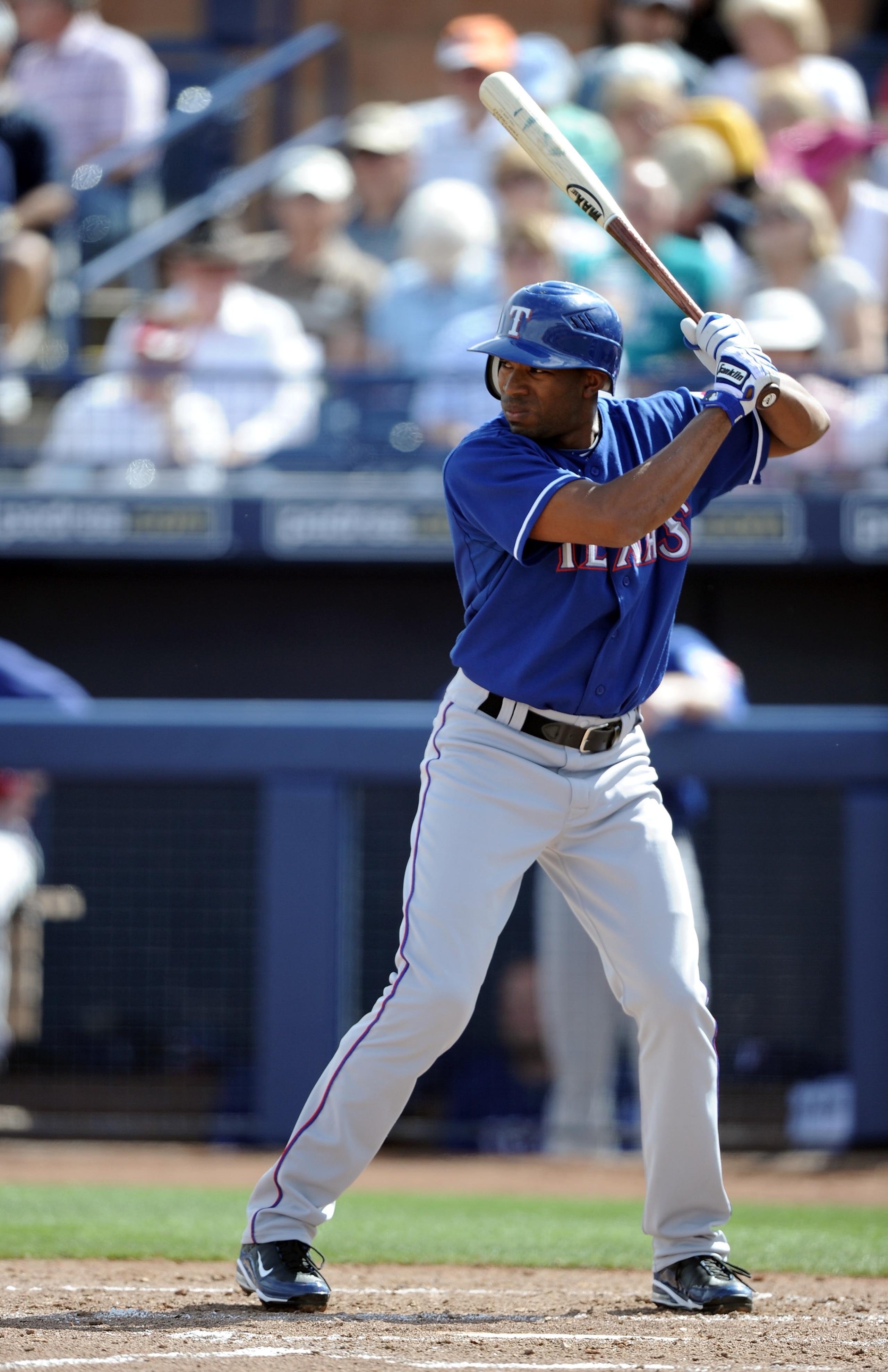 PEORIA, AZ - MARCH 01:  Endy Chavez #9 of the Texas Rangers at bat against the Seattle Mariners during spring training at Peoria Stadium on March 1, 2011 in Peoria, Arizona.  (Photo by Harry How/Getty Images)
