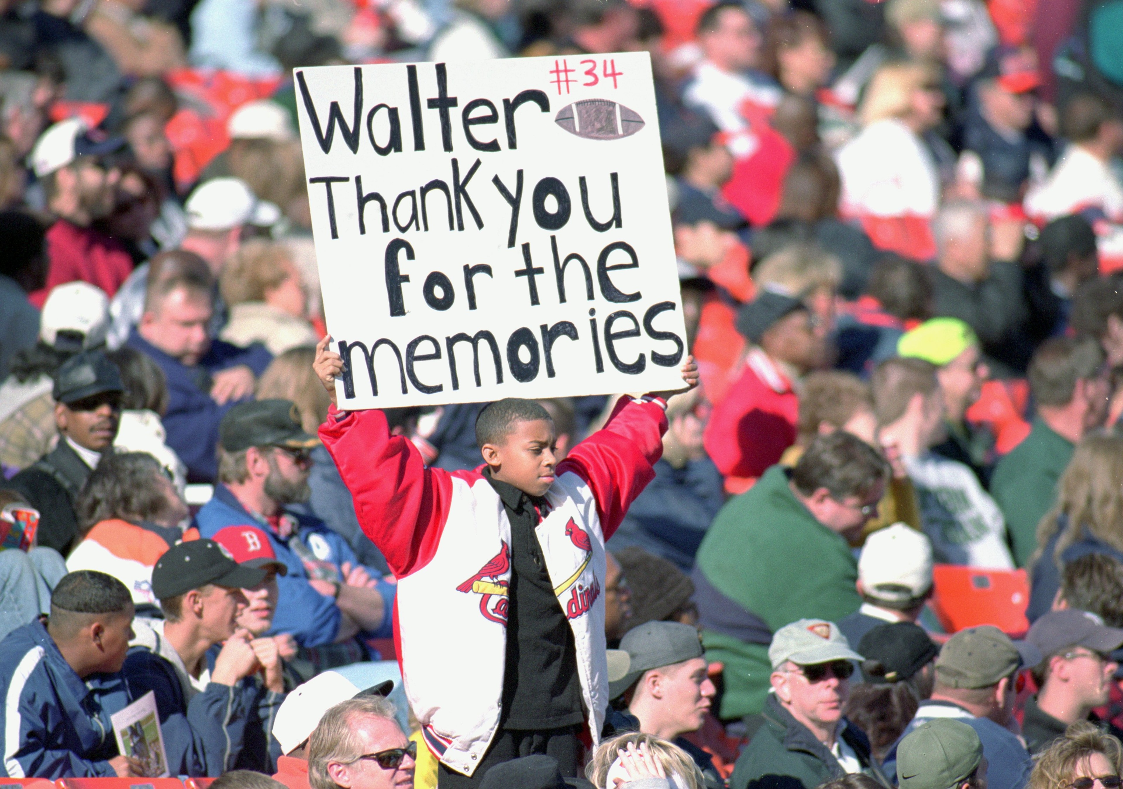 6 Nov 1999: A young fan holds up a sign during Walter Payton's Memorial Service at Soldier Field in Chicago, Illinois. Mandatory Credit: Jonathan Daniel /Allsport 6 Nov 1999: A young fan holds up a sign during Walter Payton's Memorial Service at Soldier Field in Chicago, Illinois. Mandatory Credit: Jonathan Daniel /Allsport