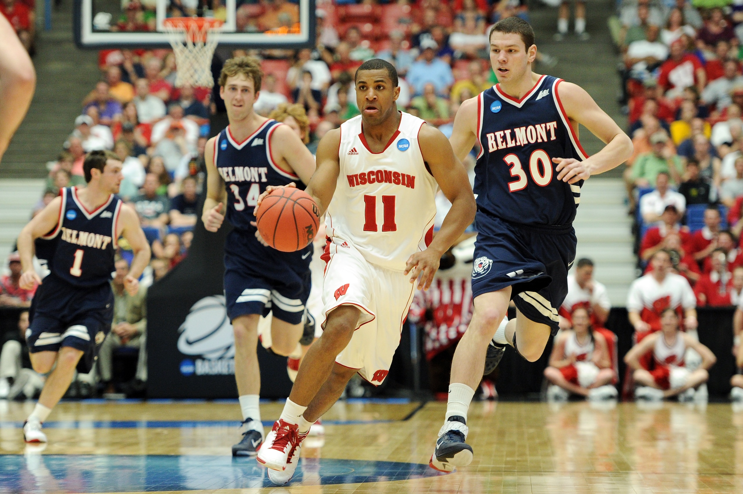 TUCSON, AZ - MARCH 17:  Jordan Taylor #11 of the Wisconsin Badgers drives down court in front of Trevor Noack #30 and Mick Hedgepeth #34 of the Belmont Bruins during the second round of the 2011 NCAA men's basketball tournament at McKale Center on March 1