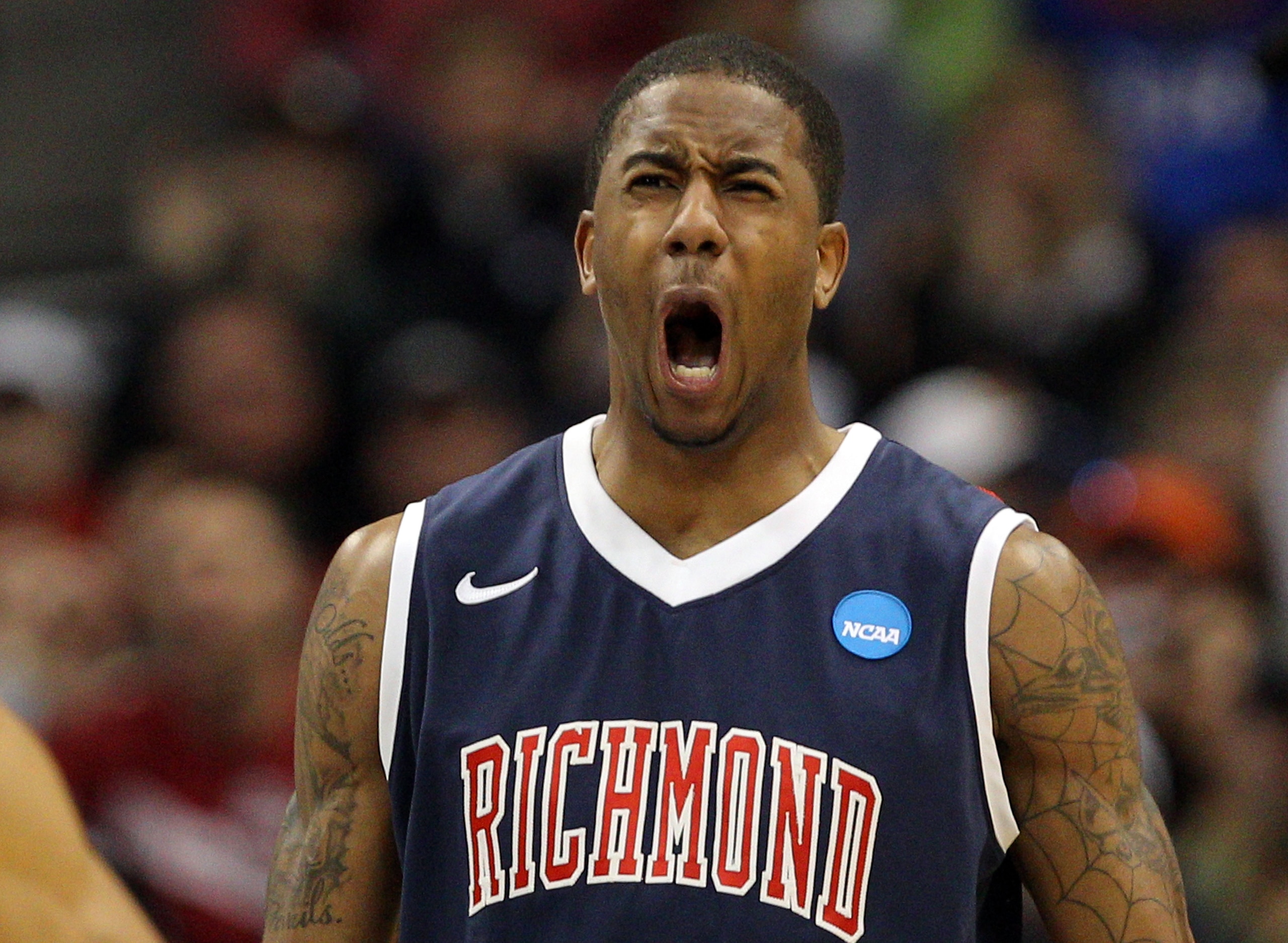 DENVER, CO - MARCH 17:  Darrius Garrett #1 of the Richmond Spiders reacts after a play against the Vanderbilt Commodores during the second round of the 2011 NCAA men's basketball tournament at Pepsi Center on March 17, 2011 in Denver, Colorado.  (Photo by