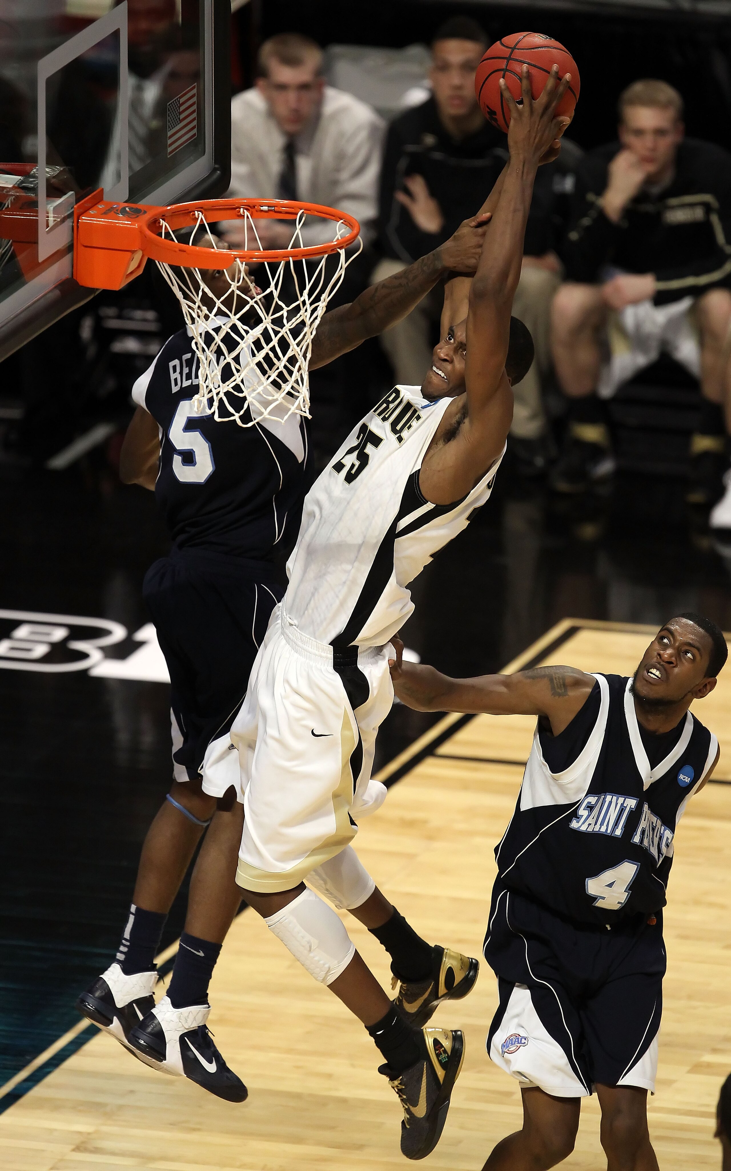 CHICAGO, IL - MARCH 18:  JaJuan Johnson #25 of the Purdue Boilermakers shoots against Jeron Belin #5 of the St. Peter's Peacocks in the second half during the second round of the 2011 NCAA men's basketball tournament at the United Center on March 18, 2011