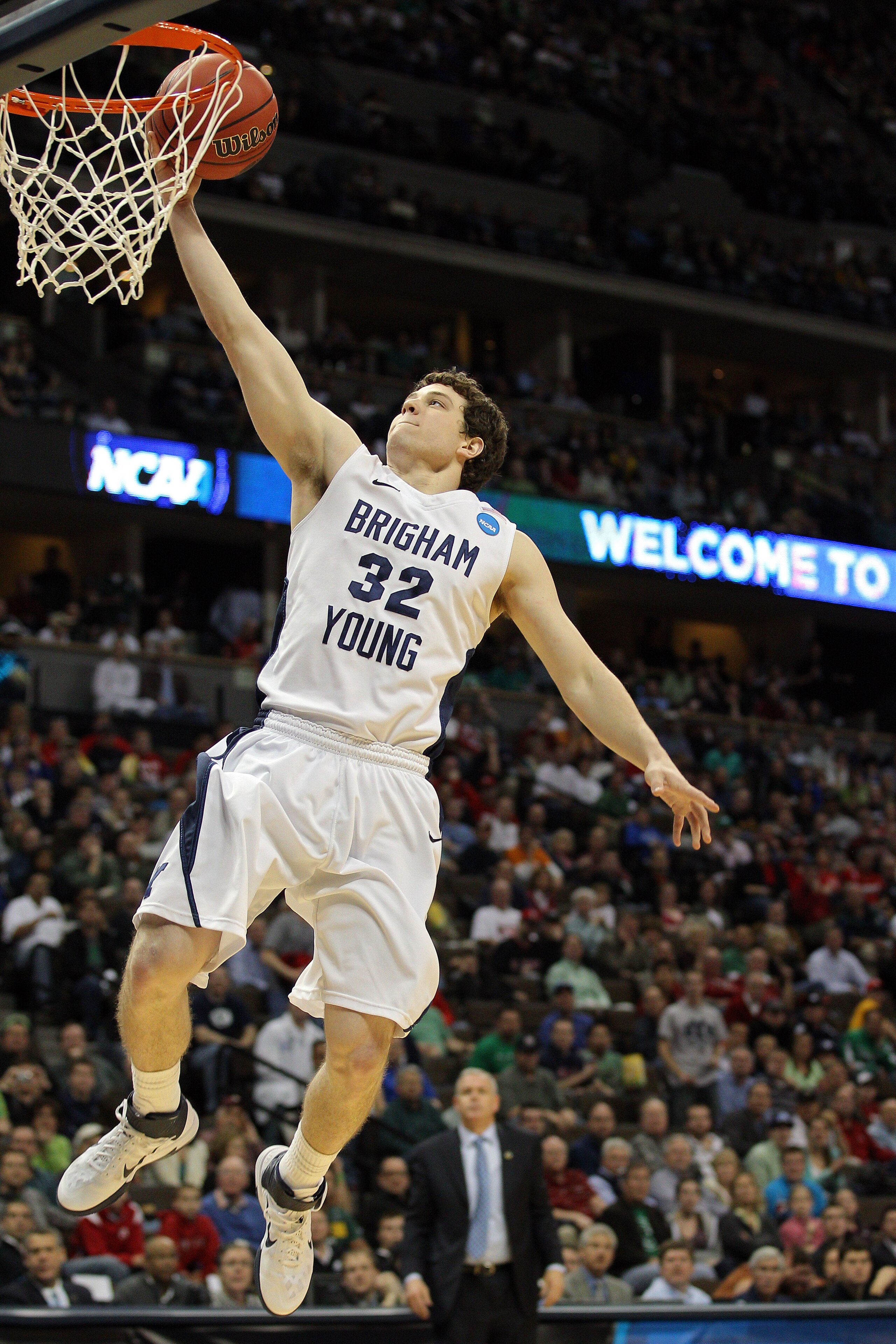 DENVER, CO - MARCH 17:  Jimmer Fredette #32 of the Brigham Young Cougars goes up for a layup against the Wofford Terriers during the second round of the 2011 NCAA men's basketball tournament at Pepsi Center on March 17, 2011 in Denver, Colorado.  (Photo b