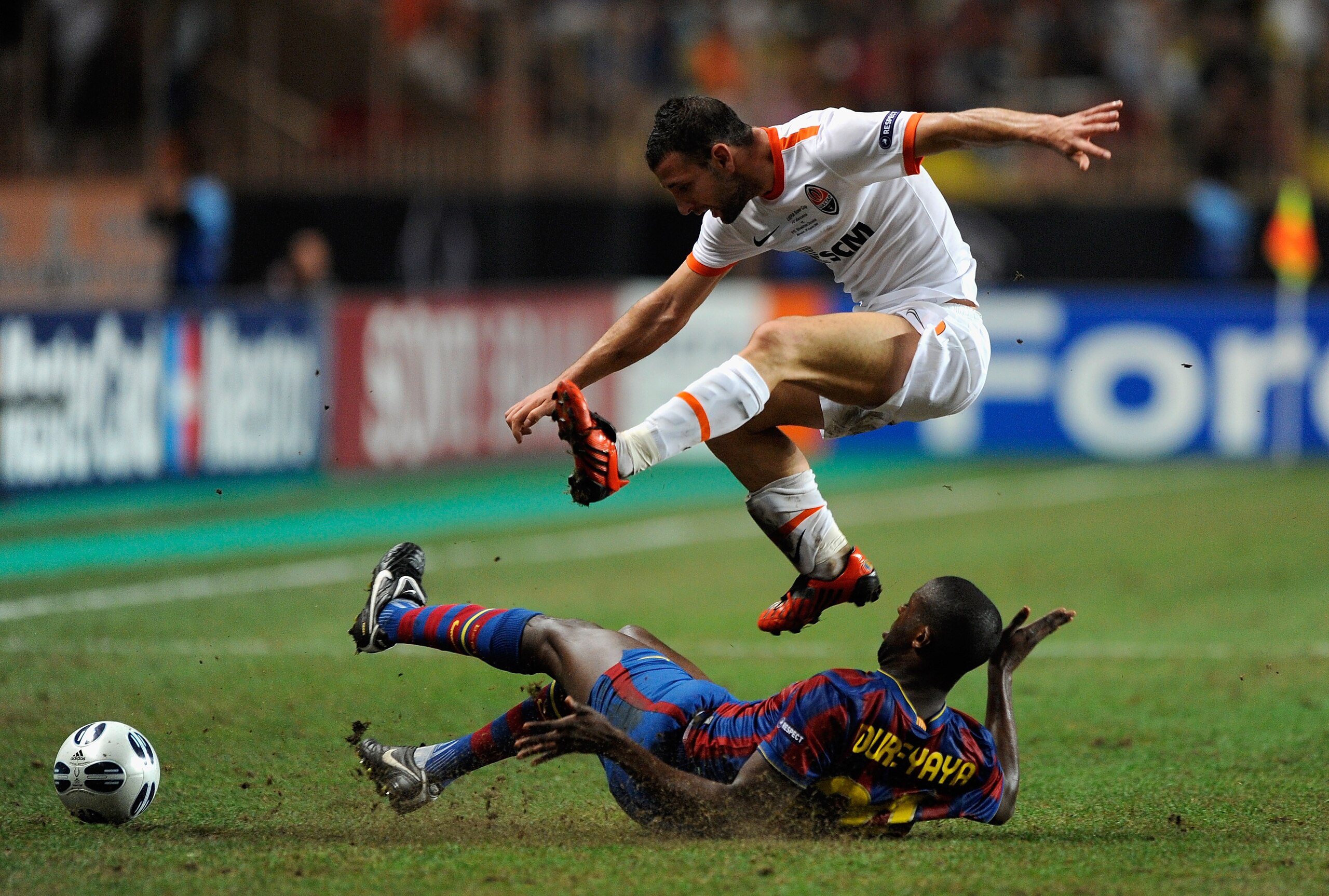 MONACO - AUGUST 28: Yaya Toure of Barcelona battles with Razvan Rat of Shakhtar Donetsk during the UEFA Super Cup Final between FC Barcelona and Shakhtar Donetsk at The Stade Louis II Stadium on August 28, 2009 in Monaco, Monaco. (Photo by Laurence Grif MONACO - AUGUST 28: Yaya Toure of Barcelona battles with Razvan Rat of Shakhtar Donetsk during the UEFA Super Cup Final between FC Barcelona and Shakhtar Donetsk at The Stade Louis II Stadium on August 28, 2009 in Monaco, Monaco. (Photo by Laurence Grif