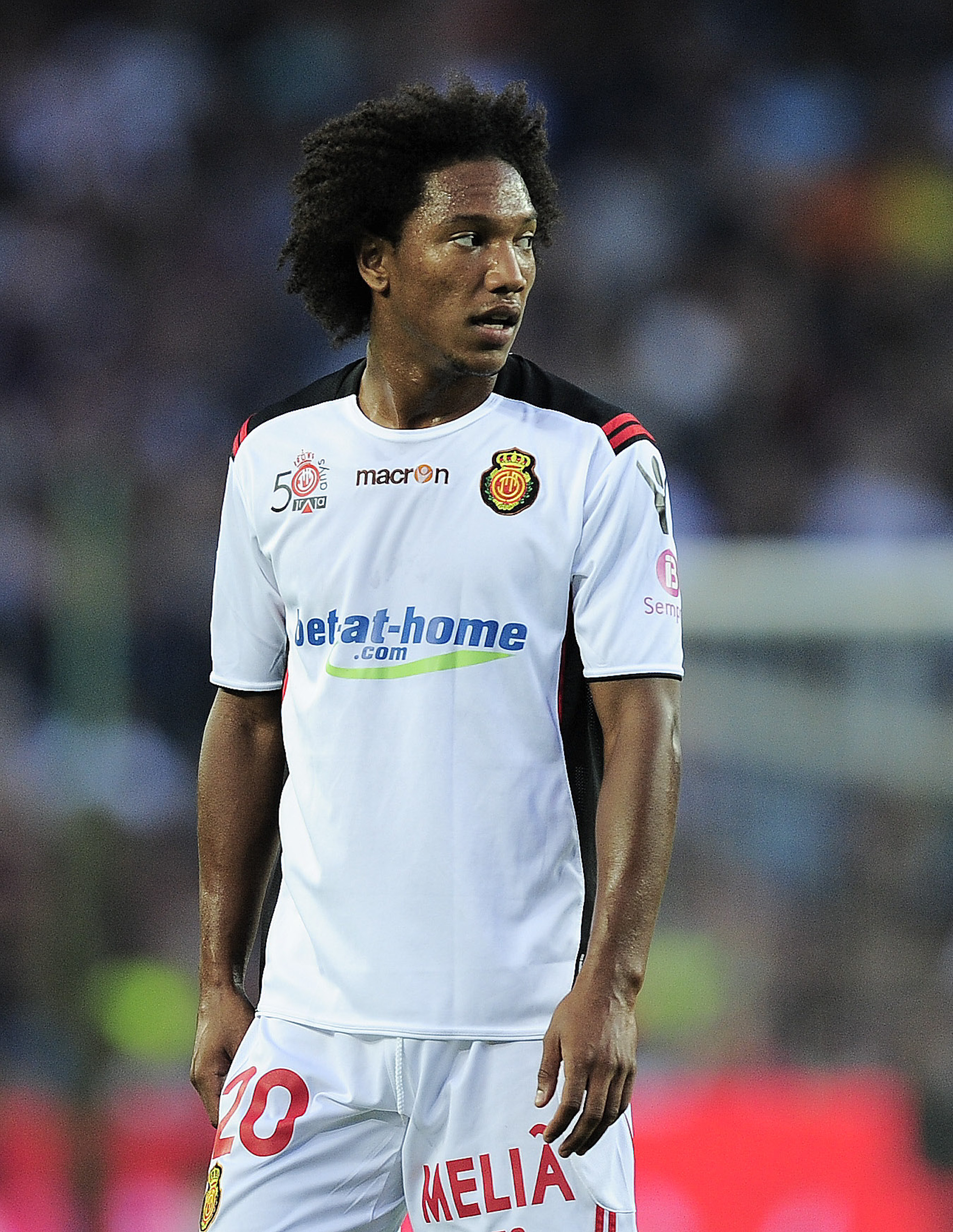 BARCELONA, SPAIN - OCTOBER 03:  Jonathan De Guzman of Mallorca looks on during the La Liga match between Barcelona and Mallorca at the Camp Nou stadium on October 3, 2010 in Barcelona, Spain. The Match ended in a 1-1 draw. (Photo by David Ramos/Getty Imag