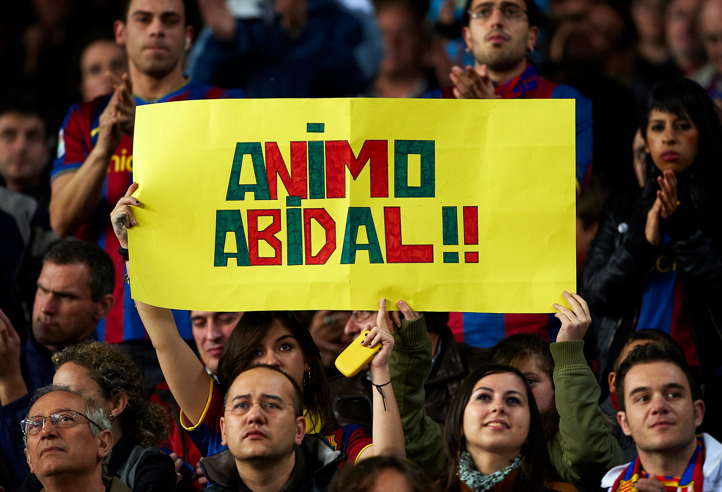 BARCELONA, SPAIN - MARCH 19:  Barcelona fans display a banner in support of Eric Abidal before the La Liga match between Barcelona and Getafe at Camp Nou on March 19, 2011 in Barcelona, Spain. Barcelona won 2-1.  (Photo by Manuel Queimadelos Alonso/Getty