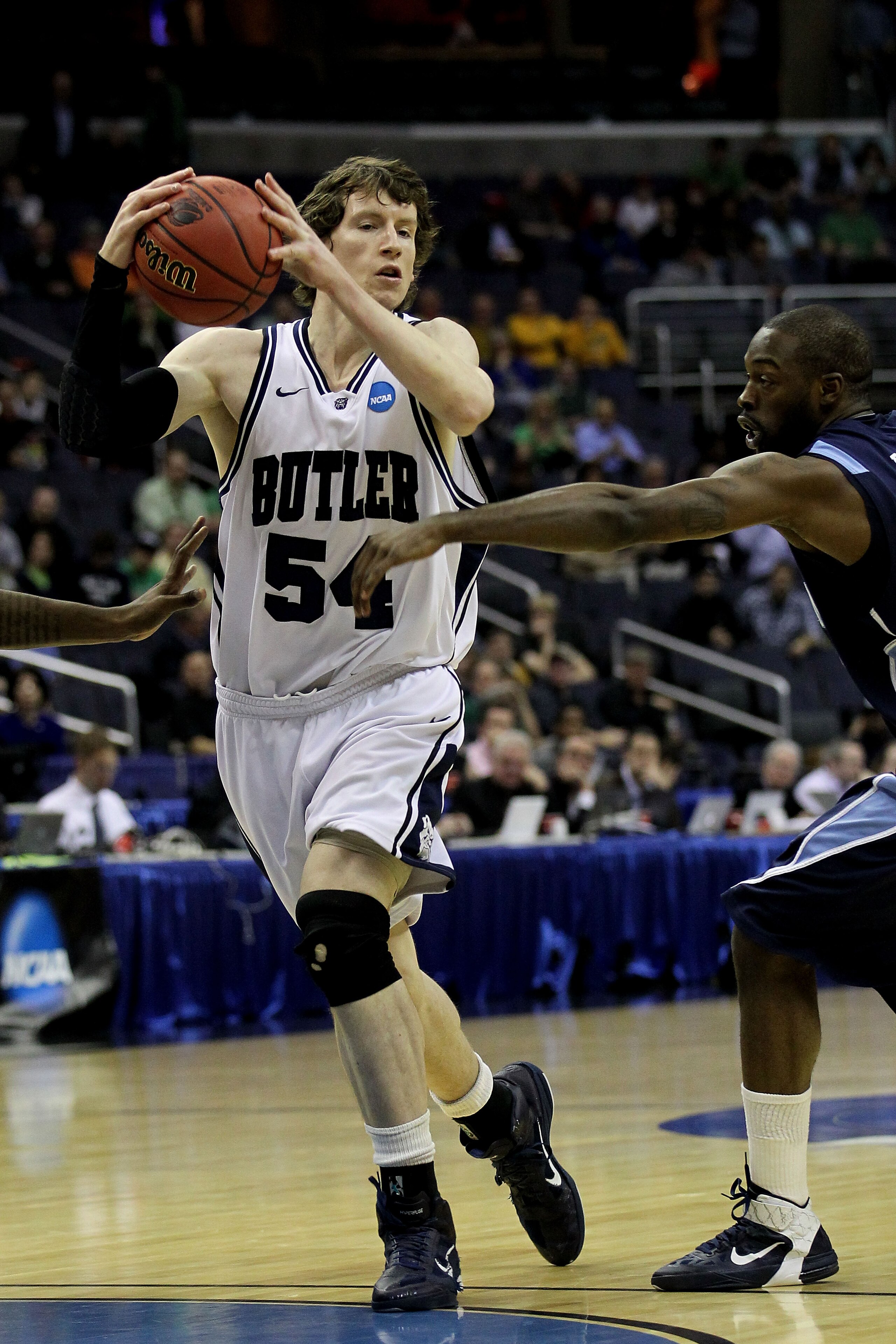 WASHINGTON - MARCH 17: Matt Howard #54 of the Butler Bulldogs drives through the key against the Old Dominion Monarchs during the second round of the 2011 NCAA men's basketball tournament at the Verizon Center on March 17, 2011 in Washington, DC. (Photo WASHINGTON - MARCH 17: Matt Howard #54 of the Butler Bulldogs drives through the key against the Old Dominion Monarchs during the second round of the 2011 NCAA men's basketball tournament at the Verizon Center on March 17, 2011 in Washington, DC. (Photo