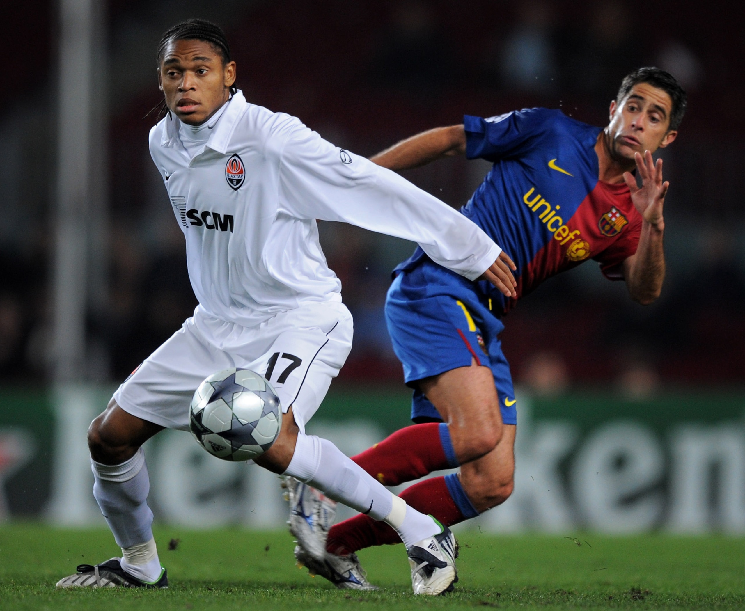 BARCELONA, SPAIN - DECEMBER 09: Luiz Adriano (L) of Shakhtar Donetsk duels for the ball with Sylvio Mendes of Barcelona during the UEFA Champions League Group C match between Barcelona and Shakhtar Donetsk at the Camp Nou stadium on December 9, 2008 in B BARCELONA, SPAIN - DECEMBER 09: Luiz Adriano (L) of Shakhtar Donetsk duels for the ball with Sylvio Mendes of Barcelona during the UEFA Champions League Group C match between Barcelona and Shakhtar Donetsk at the Camp Nou stadium on December 9, 2008 in B