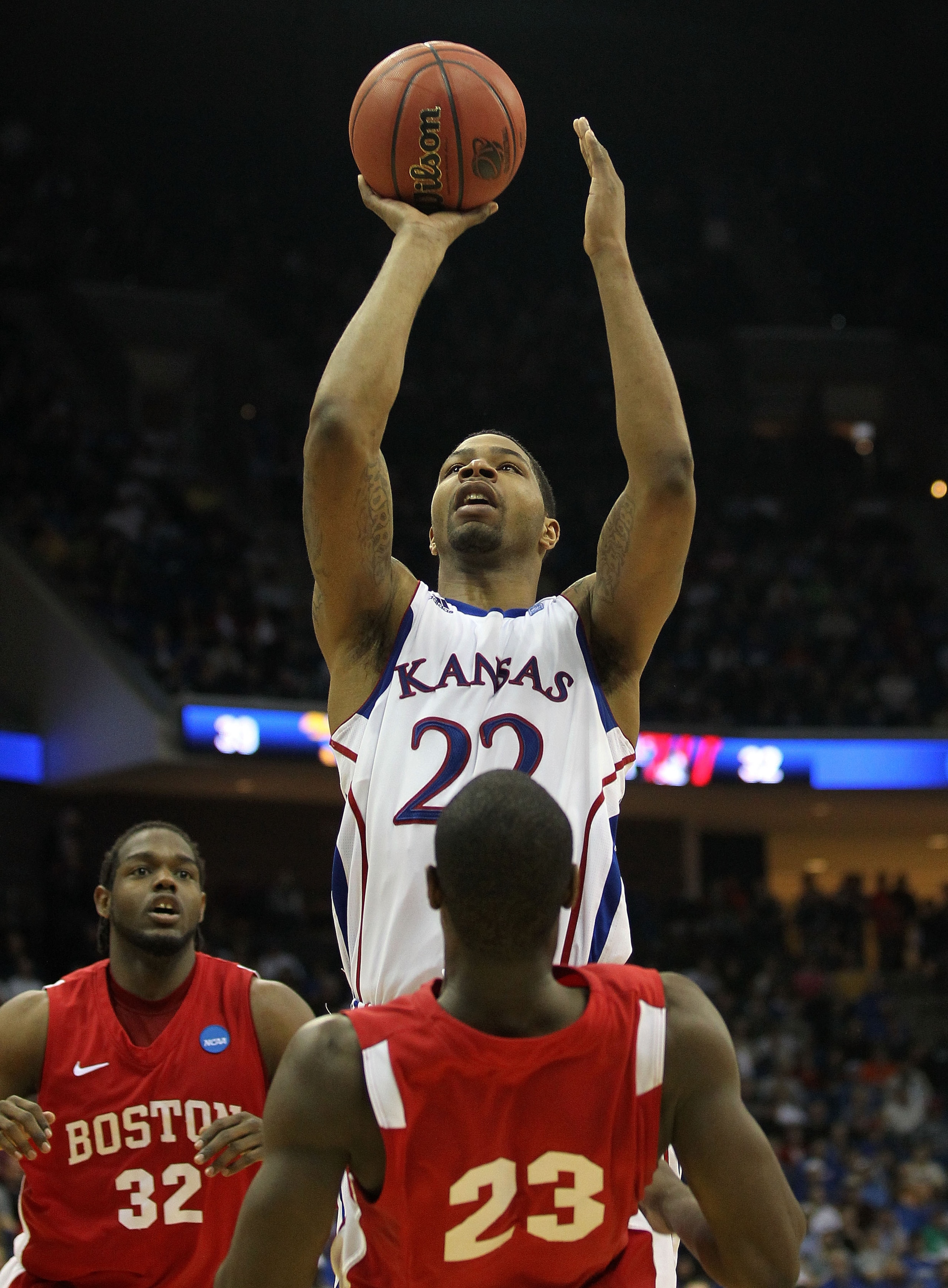 TULSA, OK - MARCH 18: Marcus Morris #22 of the Kansas Jayhawks takes a shot against the Boston University Terriers during the second round of the 2011 NCAA men's basketball tournament at BOK Center on March 18, 2011 in Tulsa, Oklahoma. (Photo by Ronald TULSA, OK - MARCH 18: Marcus Morris #22 of the Kansas Jayhawks takes a shot against the Boston University Terriers during the second round of the 2011 NCAA men's basketball tournament at BOK Center on March 18, 2011 in Tulsa, Oklahoma. (Photo by Ronald