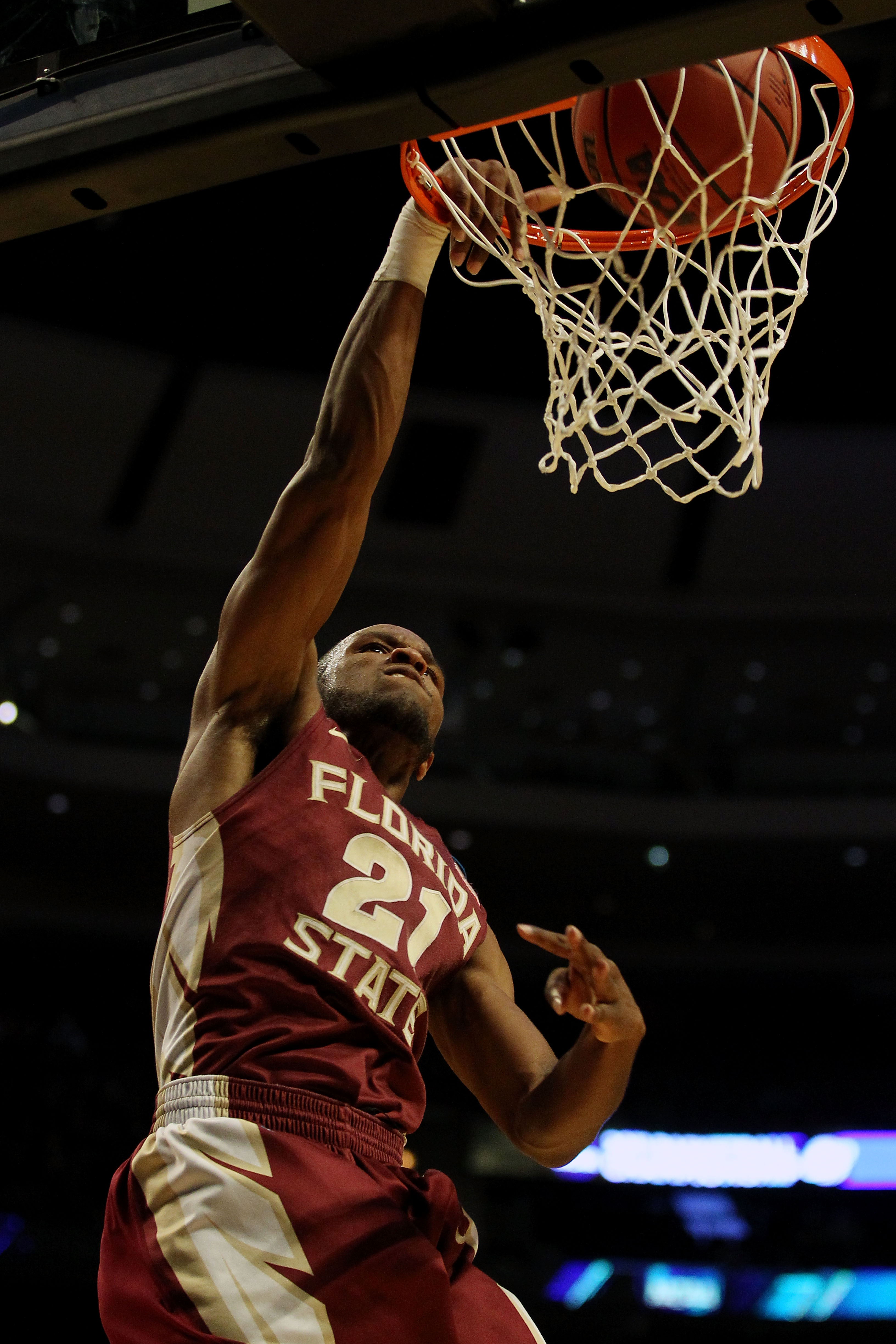CHICAGO, IL - MARCH 18: Michael Snaer #21 of the Florida State Seminoles shoots against the Texas A&M Aggies in the second half during the second round of the 2011 NCAA men's basketball tournament at the United Center on March 18, 2011 in Chicago, Illino