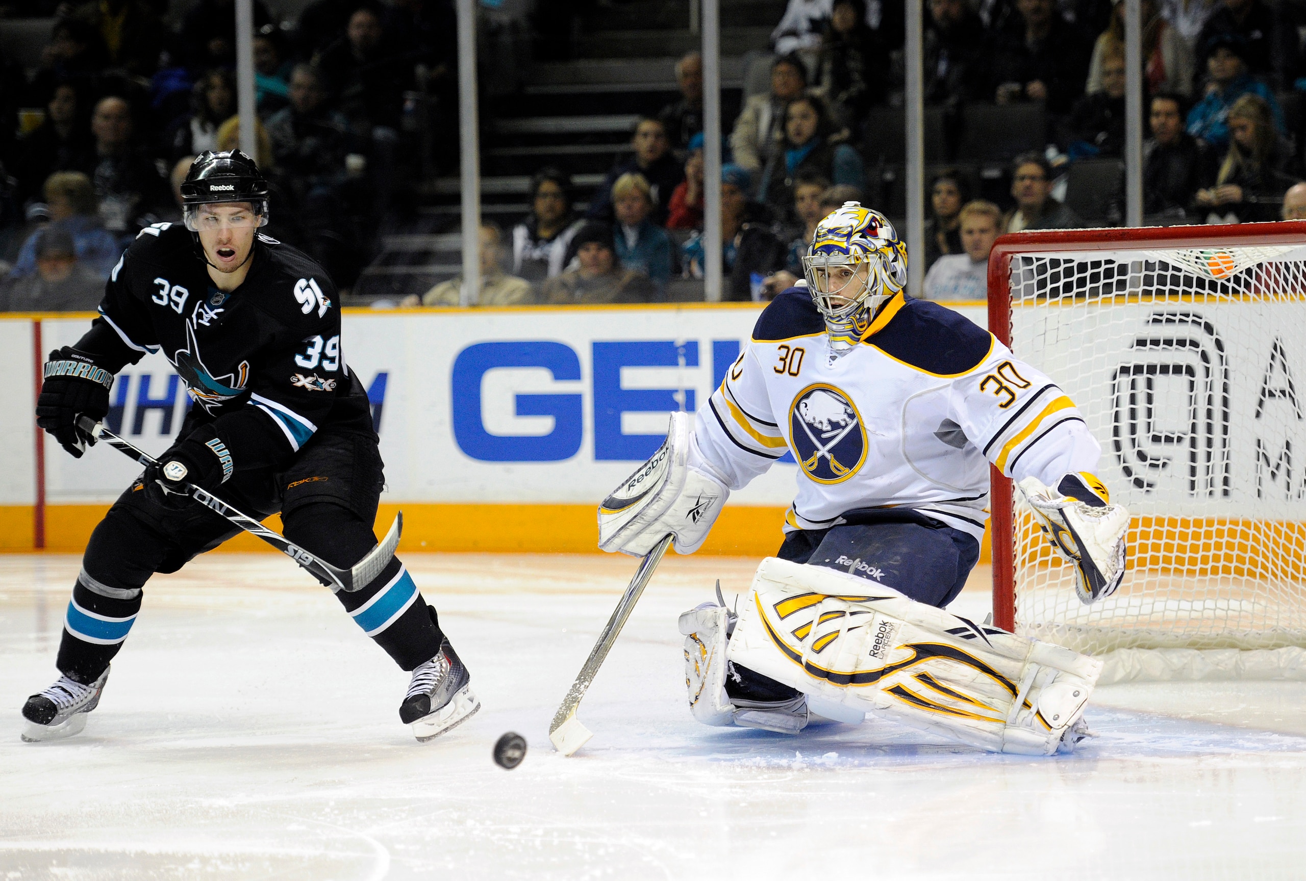 SAN JOSE, CA - JANUARY 6: Goalie Ryan Miller #30 of the Buffalo Sabres makes a save in front of Logan Couture #39 of the San Jose Sharks during an NHL hockey game at the HP Pavilion on January 6, 2011 in San Jose, California. (Photo by Thearon W. Henders SAN JOSE, CA - JANUARY 6: Goalie Ryan Miller #30 of the Buffalo Sabres makes a save in front of Logan Couture #39 of the San Jose Sharks during an NHL hockey game at the HP Pavilion on January 6, 2011 in San Jose, California. (Photo by Thearon W. Henders