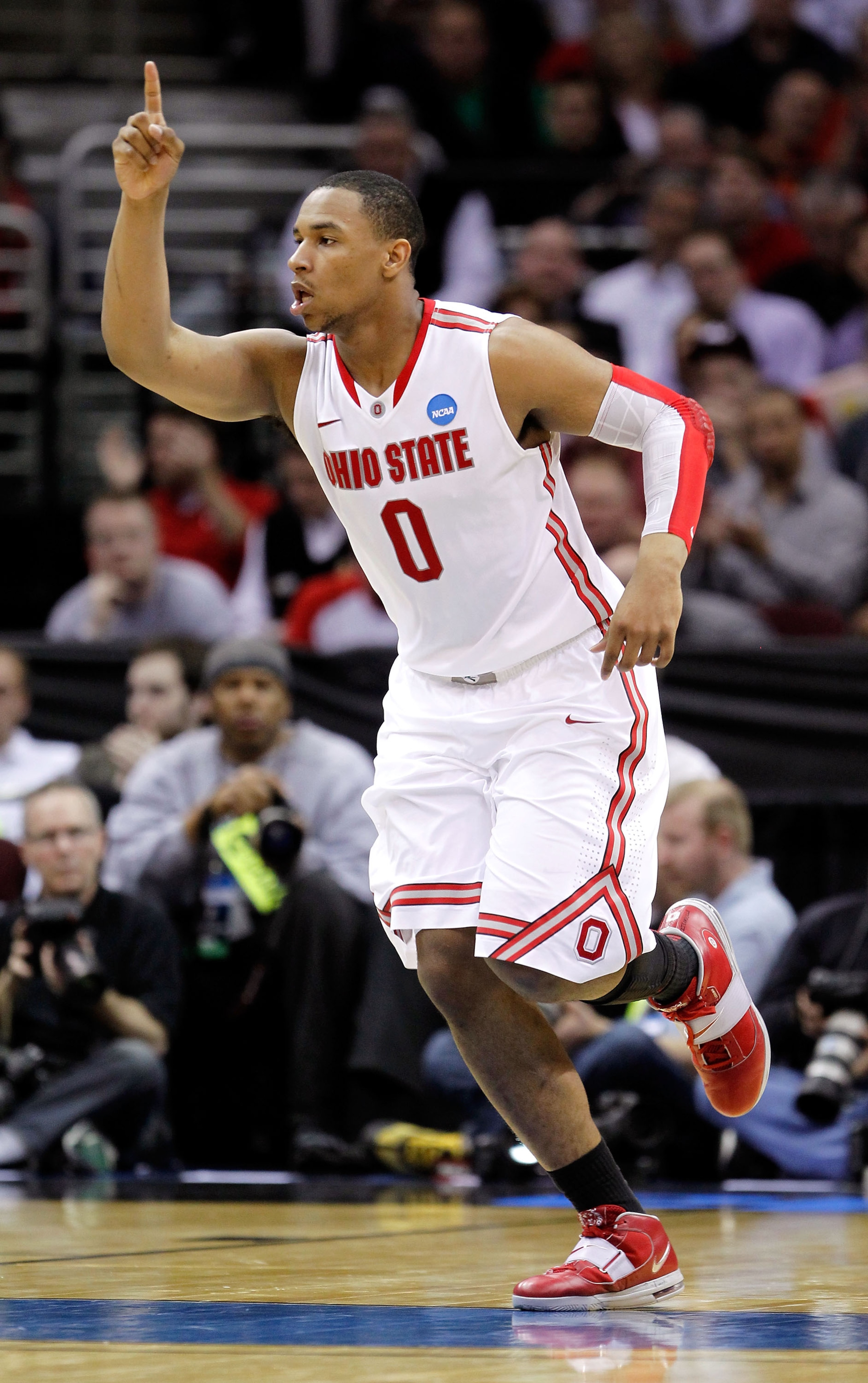 CLEVELAND, OH - MARCH 18: Jared Sullinger #0 of the Ohio State Buckeyes reacts after a play in the second half against the Texas-San Antonio Roadrunners during the second round of the 2011 NCAA men's basketball tournament at Quicken Loans Arena on March 1 CLEVELAND, OH - MARCH 18: Jared Sullinger #0 of the Ohio State Buckeyes reacts after a play in the second half against the Texas-San Antonio Roadrunners during the second round of the 2011 NCAA men's basketball tournament at Quicken Loans Arena on March 1