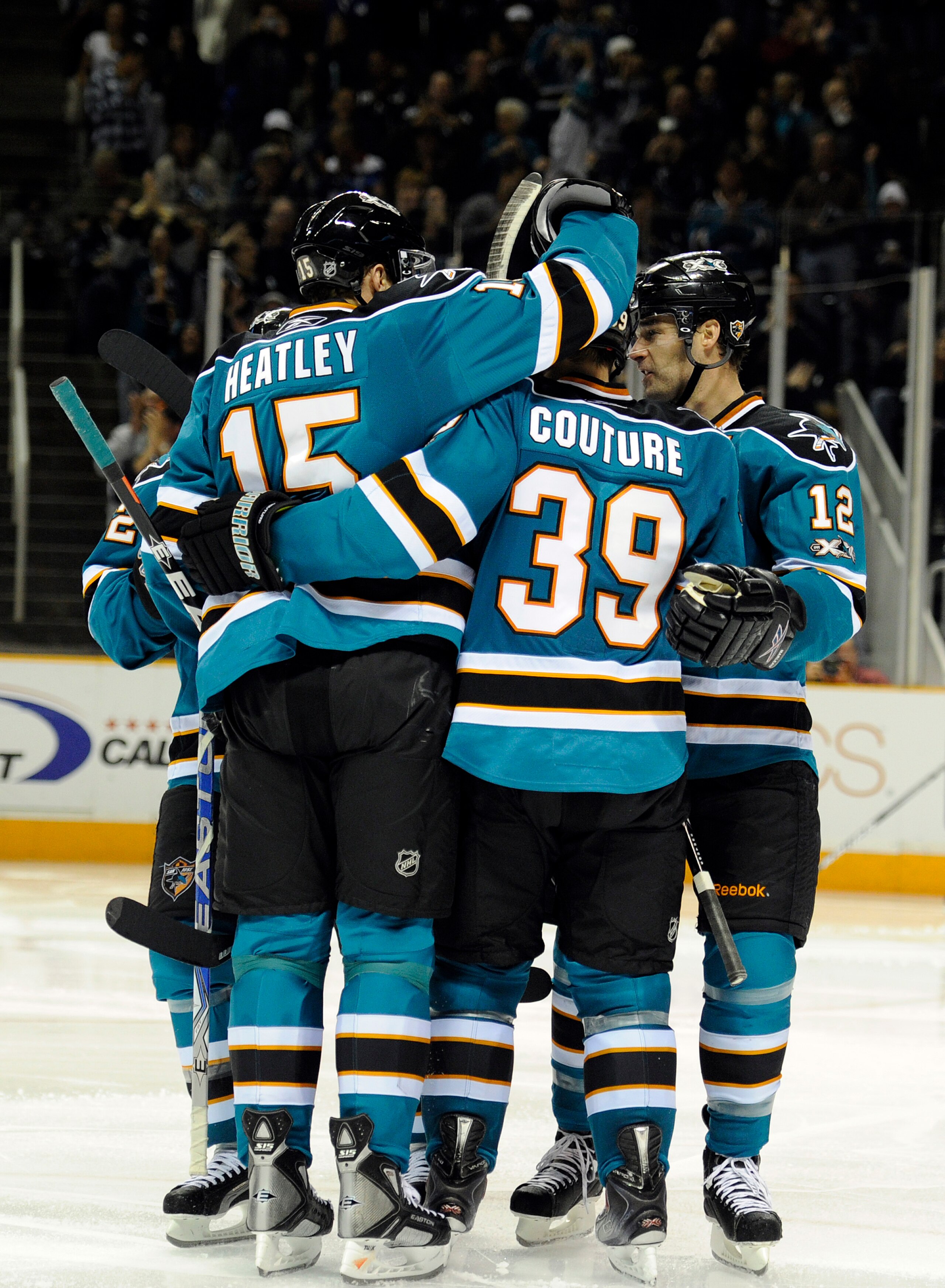 SAN JOSE, CA - NOVEMBER 6: Logan Couture #39 of the San Jose Sharks celebrates his 5th goal of the year with teammates Patrick Marleau #12 and Dany Heatley #15 against Tampa Bay Lightning during an NHL hockey game at the HP Pavilion on November 6, 2010 i SAN JOSE, CA - NOVEMBER 6: Logan Couture #39 of the San Jose Sharks celebrates his 5th goal of the year with teammates Patrick Marleau #12 and Dany Heatley #15 against Tampa Bay Lightning during an NHL hockey game at the HP Pavilion on November 6, 2010 i
