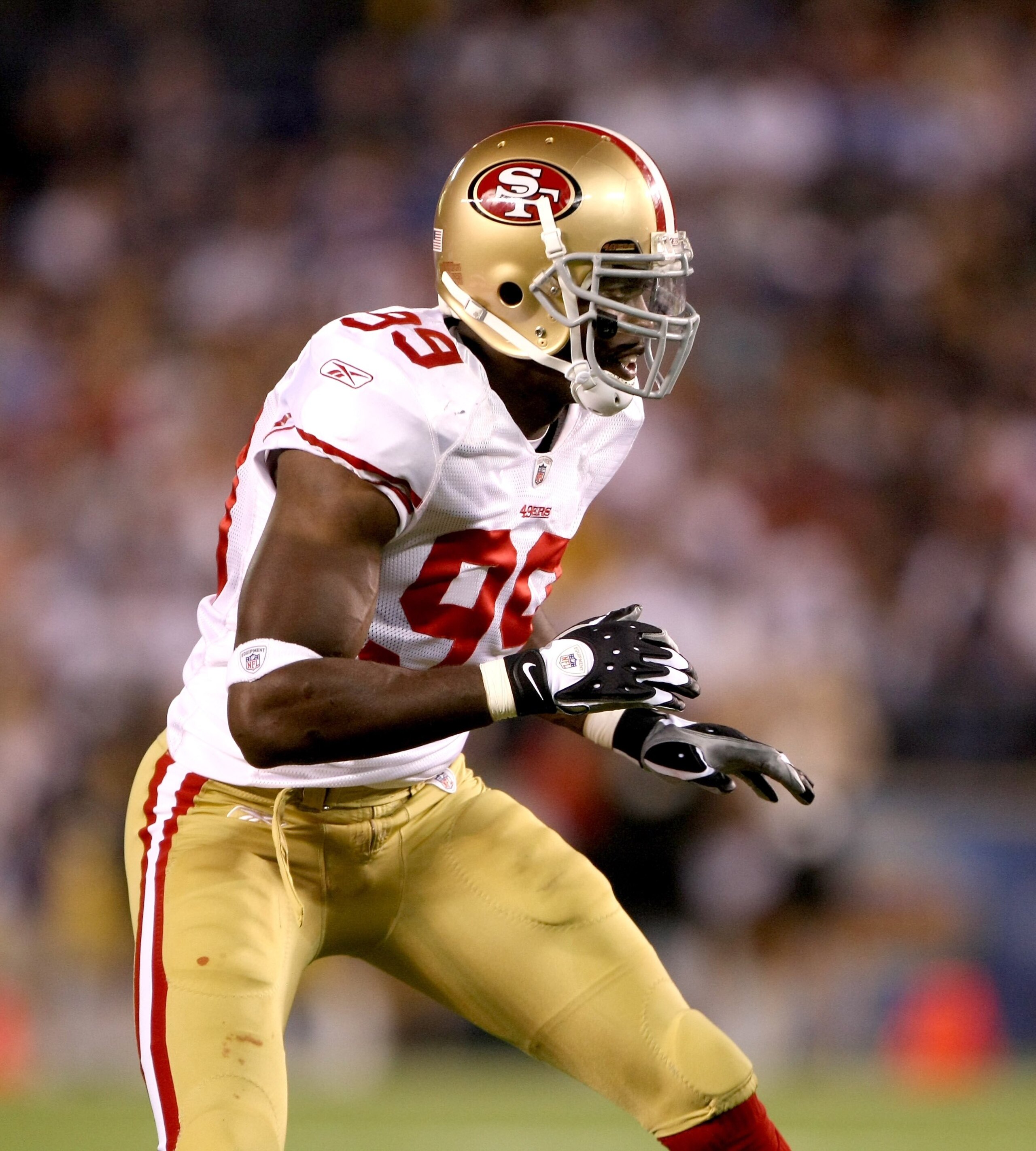 SAN DIEGO - SEPTEMBER 04:  Linebacker Manny Lawson #99 of the San Francisco 49ers plays against the San Diego Chargers on September 4, 2009 at Qualcomm Stadium in San Diego, California.  The Chargers won 26-7.  (Photo by Stephen Dunn/Getty Images)