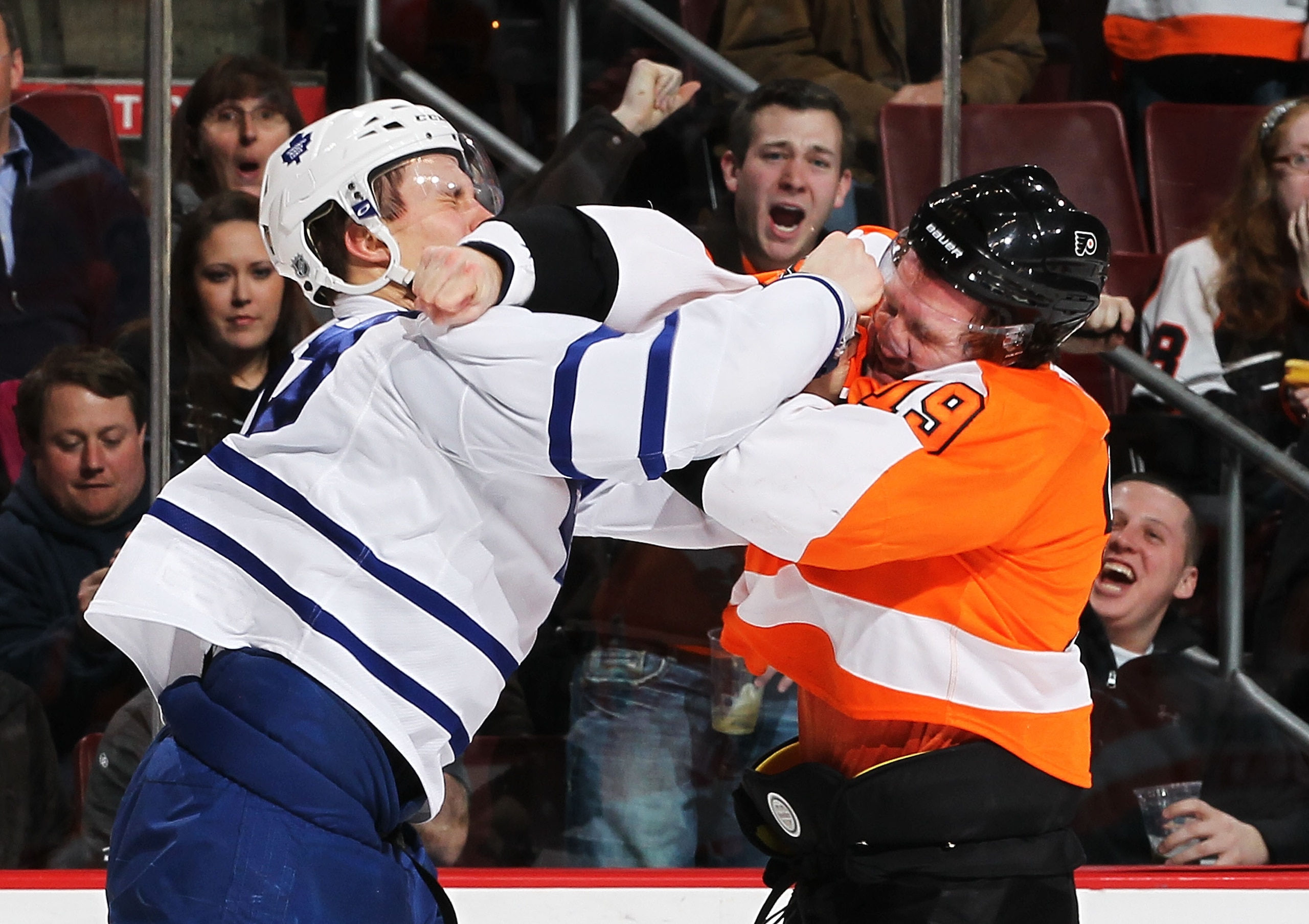 PHILADELPHIA - MARCH 03: Keith Aulie #59 of the Toronto Maple Leafs and Scott Hartnell #19 of The Philadelphia Flyers exchange punches during their game on March 3, 2011 at The Wells Fargo Center in Philadelphia, Pennsylvania. (Photo by Al Bello/Getty I PHILADELPHIA - MARCH 03: Keith Aulie #59 of the Toronto Maple Leafs and Scott Hartnell #19 of The Philadelphia Flyers exchange punches during their game on March 3, 2011 at The Wells Fargo Center in Philadelphia, Pennsylvania. (Photo by Al Bello/Getty I