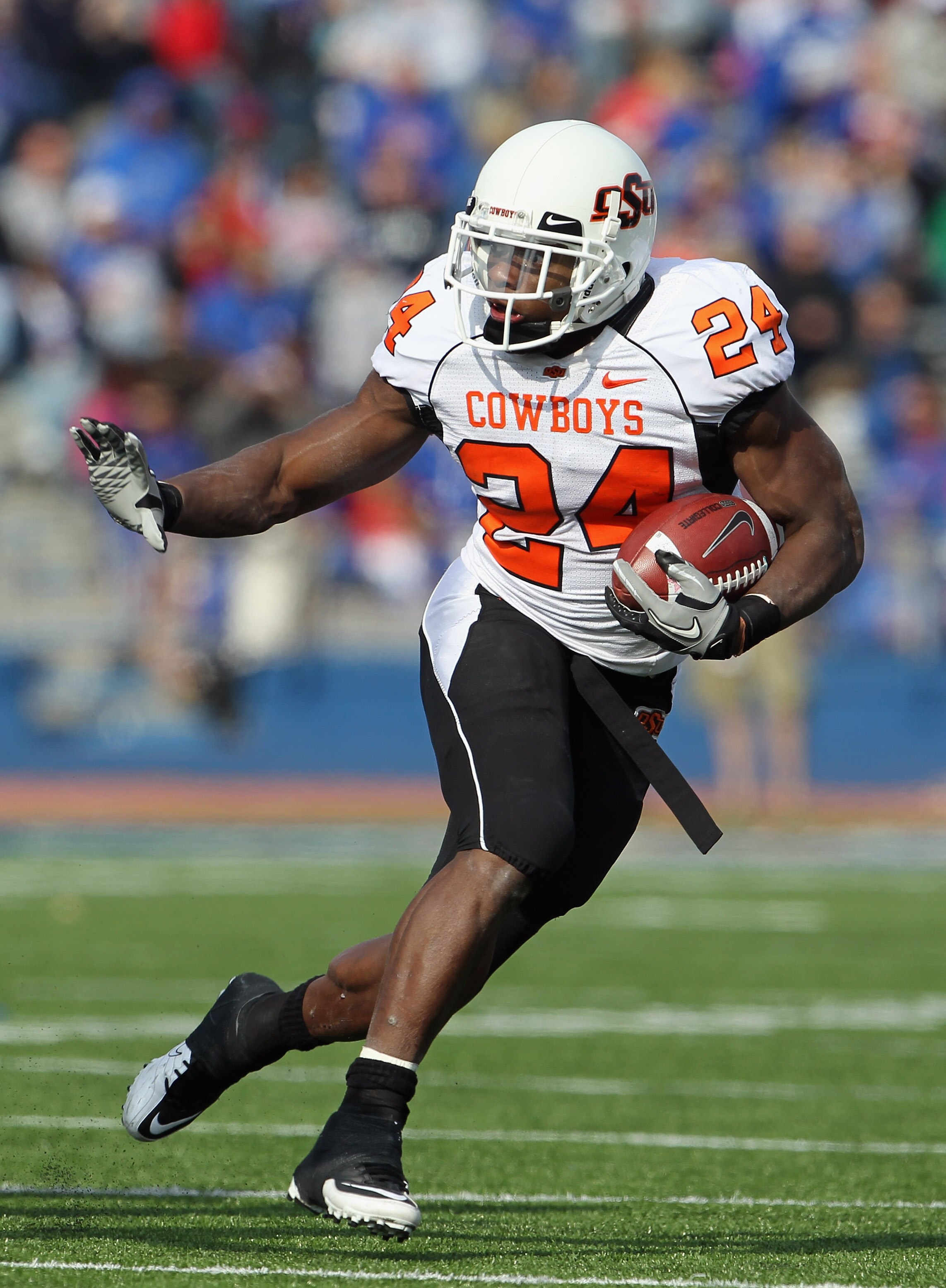 LAWRENCE, KS - NOVEMBER 20:  Running back Kendall Hunter #24 of the Oklahoma State Cowboys carries the ball during the game against the Kansas Jayhawks on November 20, 2010 at Memorial Stadium in Lawrence, Kansas.  (Photo by Jamie Squire/Getty Images)