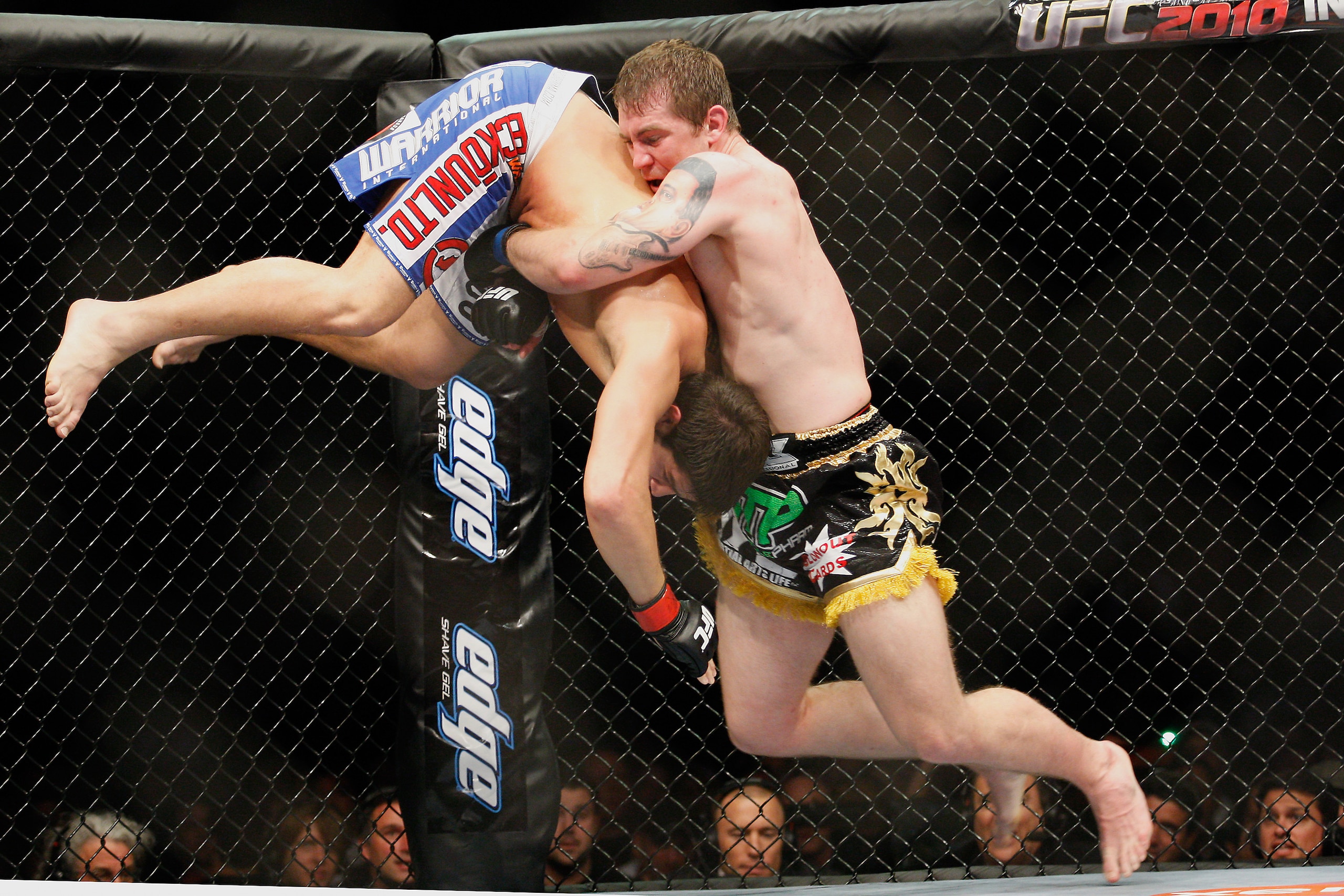 MONTREAL- MAY 8: Alan Belcher (R) holds on to Patrick Cote in their middleweight bout at UFC 113 at Bell Centre on May 8, 2010 in Montreal, Quebec, Canada.  (Photo by Richard Wolowicz/Getty Images)