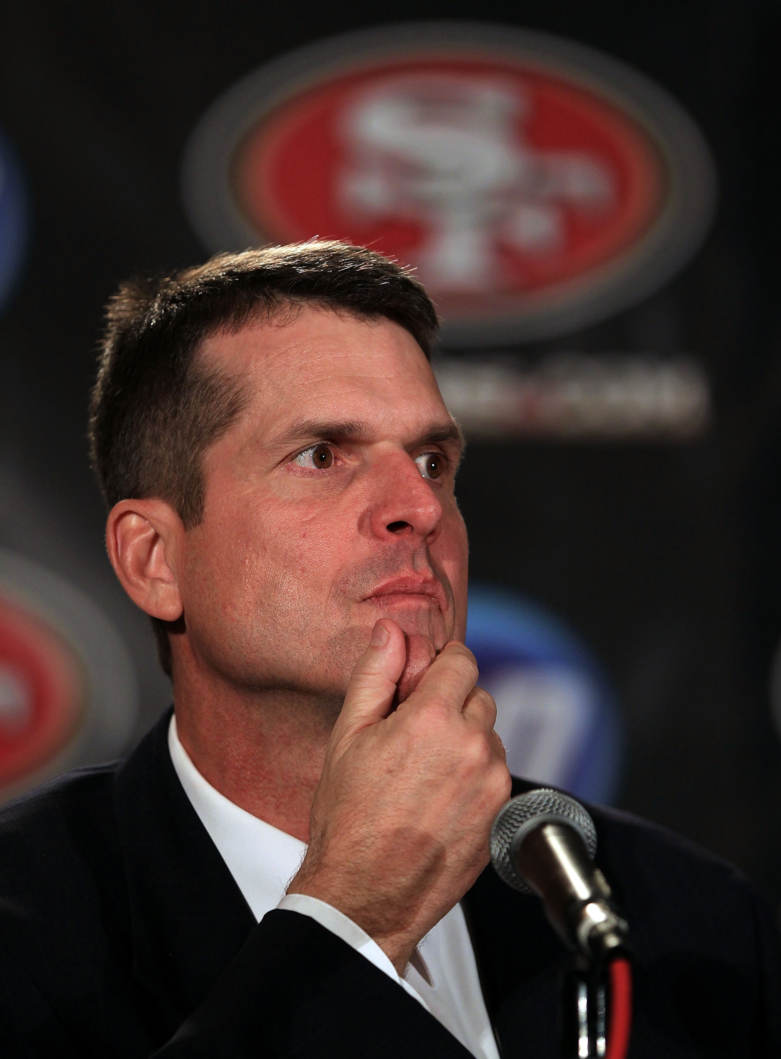 SAN FRANCISCO, CA - JANUARY 07:  Jim Harbaugh speaks at a press conference where he was introduced as the new San Francisco 49ers head coach at the Palace Hotel on January 7, 2011 in San Francisco, California.  (Photo by Ezra Shaw/Getty Images)