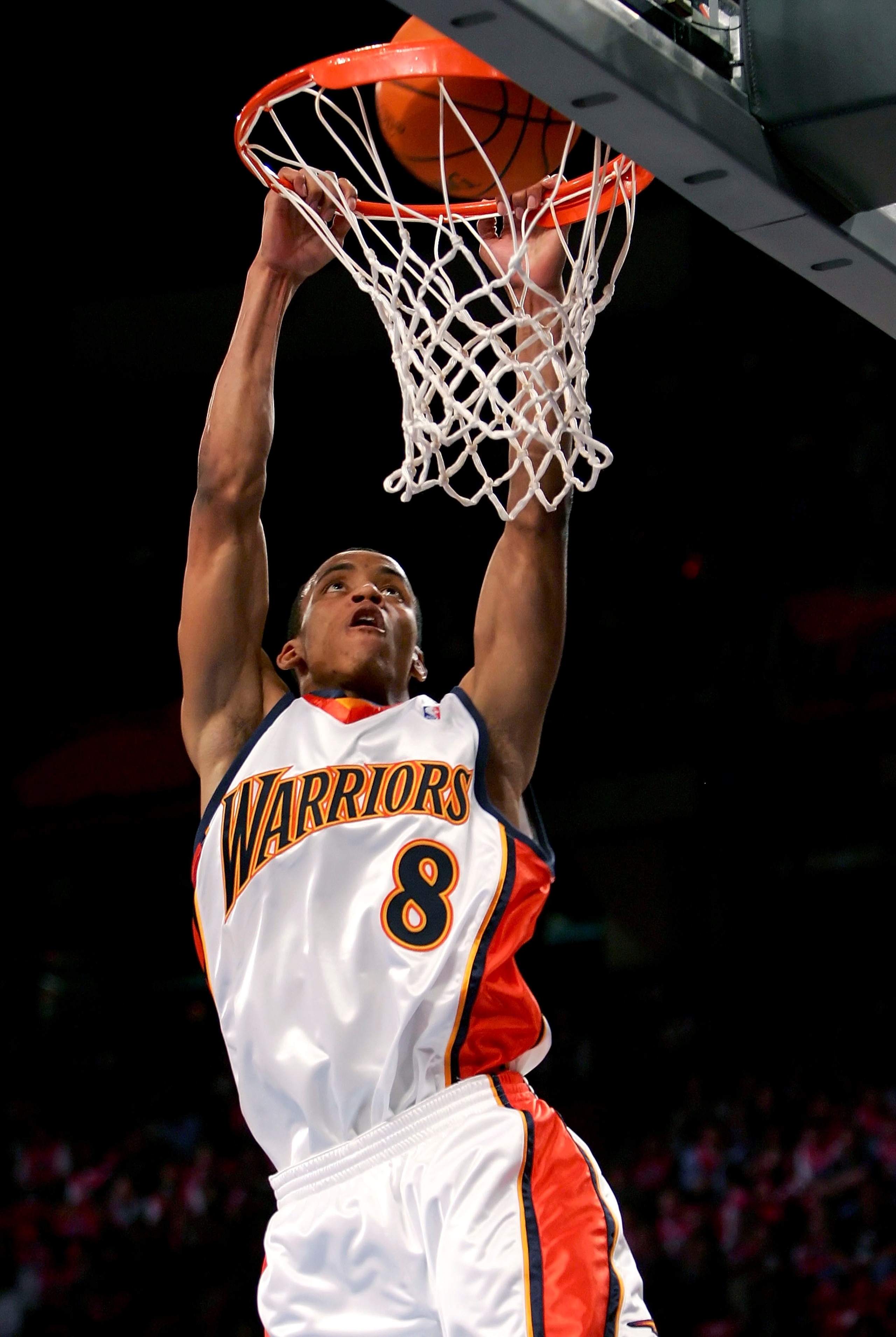 LAS VEGAS - FEBRUARY 16:  Monta Ellis #8 of the Sophomore Team goes to the basket for a slam dunk during the T-Mobile Rookie Challenge at NBA All-Star Weekend on February 16, 2007 at Thomas & Mack Center in Las Vegas, Nevada.  NOTE TO USER: User expressly