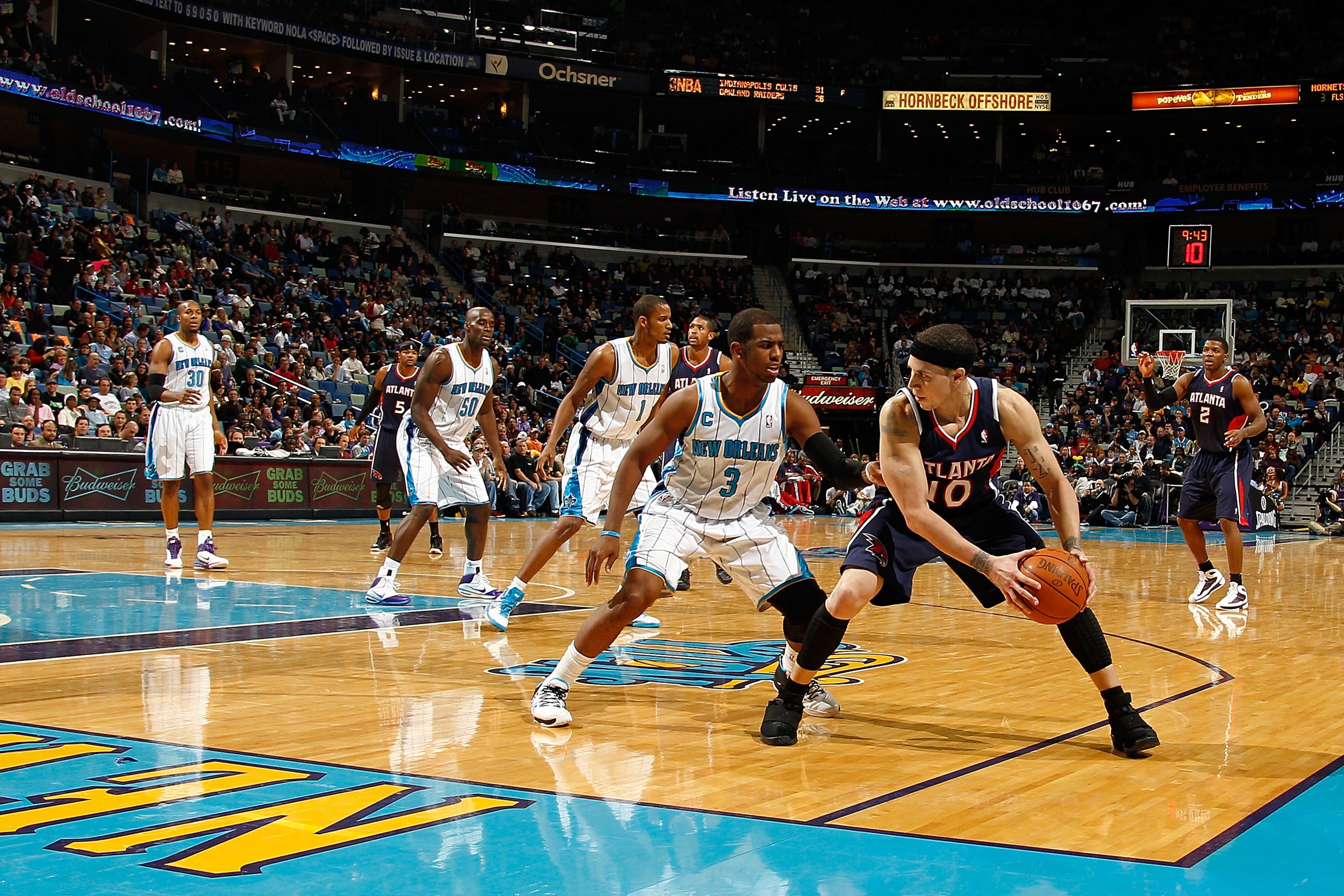 NEW ORLEANS, LA - DECEMBER 26: Mike Bibby #10 of the Atlanta Hawks looks to pass the ball around Chris Paul #3 of the New Orleans Hornets at the New Orleans Arena on December 26, 2010 in New Orleans, Louisiana. The Hornets defeated the Hawks 93-86. NO NEW ORLEANS, LA - DECEMBER 26: Mike Bibby #10 of the Atlanta Hawks looks to pass the ball around Chris Paul #3 of the New Orleans Hornets at the New Orleans Arena on December 26, 2010 in New Orleans, Louisiana. The Hornets defeated the Hawks 93-86. NO
