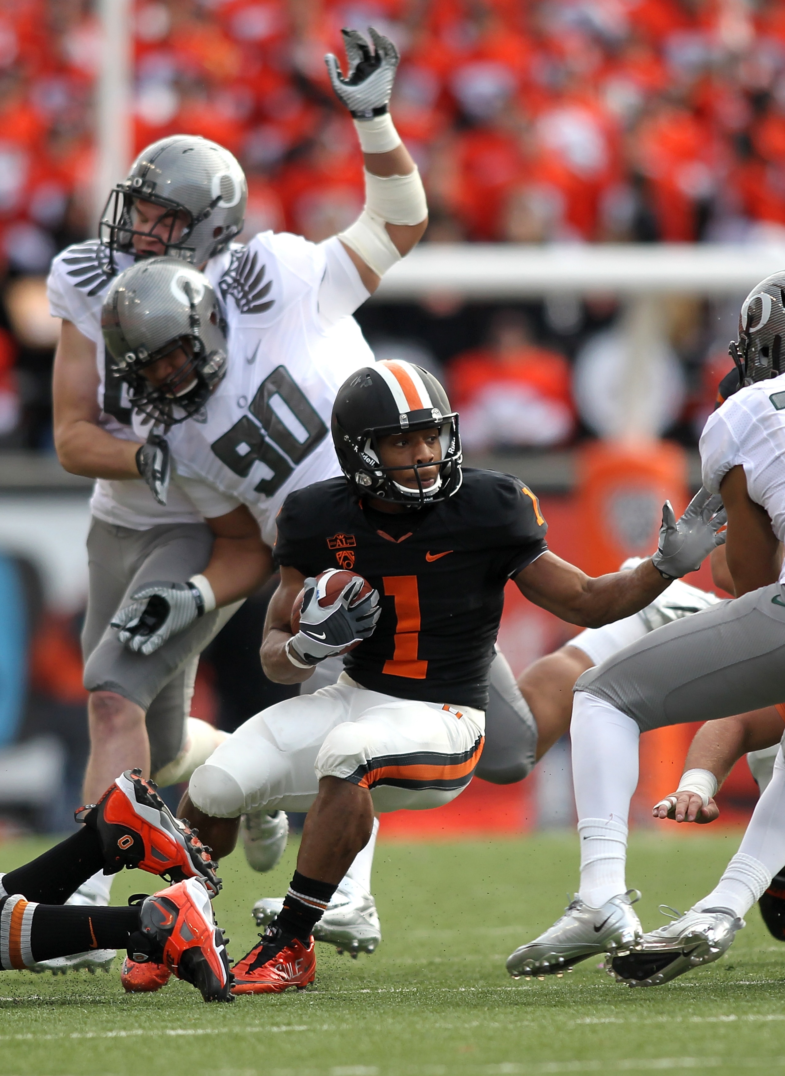 CORVALLIS, OR - DECEMBER 04: Jacquizz Rodgers #1 of the Oregon State Beavers runs the ball against the Oregon Ducks during the 114th Civil War on December 4, 2010 at the Reser Stadium in Corvallis, Oregon. (Photo by Jonathan Ferrey/Getty Images) CORVALLIS, OR - DECEMBER 04: Jacquizz Rodgers #1 of the Oregon State Beavers runs the ball against the Oregon Ducks during the 114th Civil War on December 4, 2010 at the Reser Stadium in Corvallis, Oregon. (Photo by Jonathan Ferrey/Getty Images)