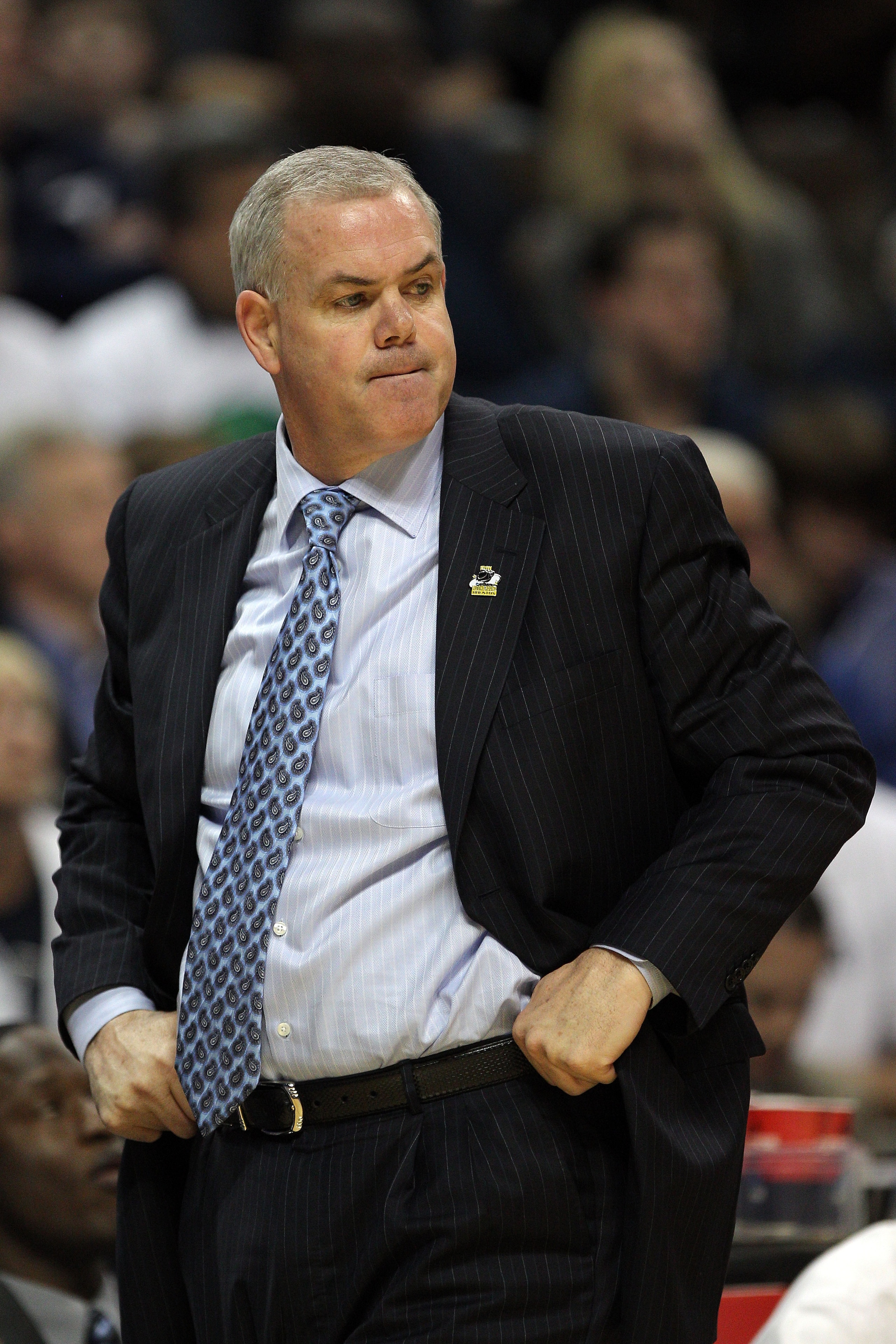 DENVER, CO - MARCH 17:  Head coach Dave Rose of the Brigham Young Cougars looks on from the bench during the second round of the 2011 NCAA men's basketball tournament at Pepsi Center on March 17, 2011 in Denver, Colorado.  (Photo by Justin Edmonds/Getty I