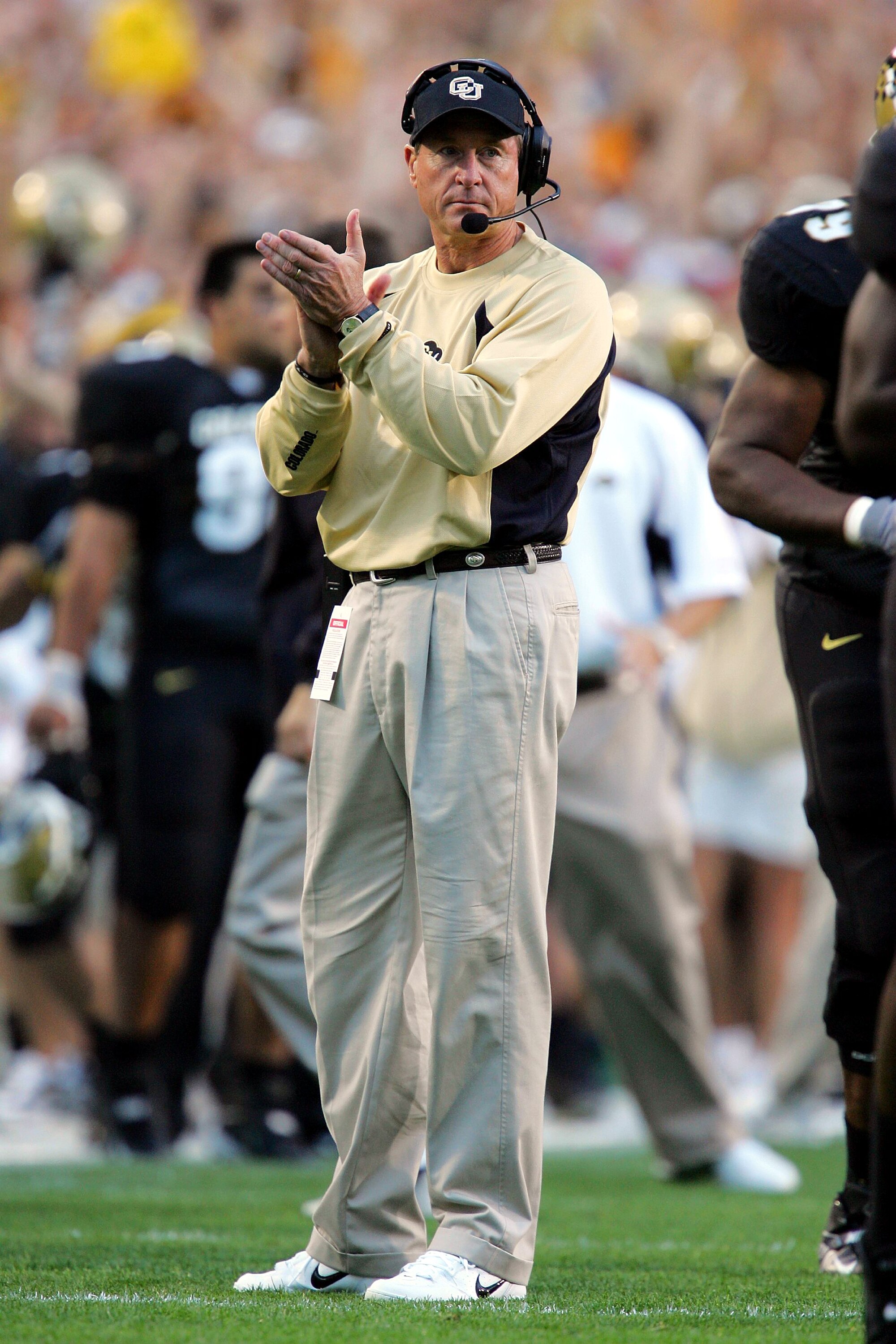 BOULDER, CO - SEPTEMBER 4:  Head coach Gary Barnett of the University of Colorado Buffaloes claps after Joel Klatt #14 scored a touchdown against the Colorado State University Rams on September 4, 2004 at Folsom Field in Boulder, Colorado.   (Photo by Ron