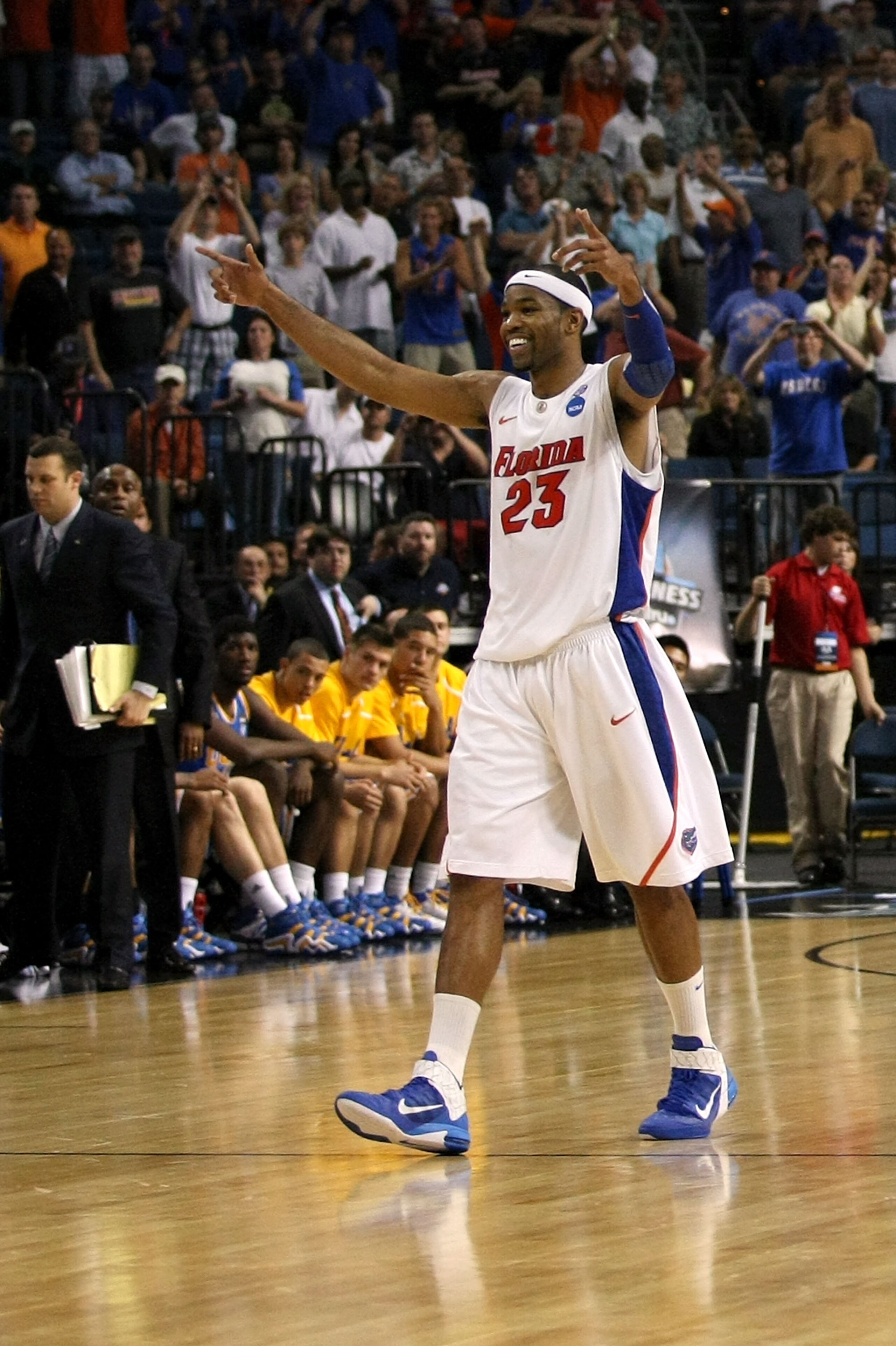 TAMPA, FL - MARCH 19:  Alex Tyus #23 of the Florida Gators celebrates on court after Florida won 73-65 against the UCLA Bruins during the third round of the 2011 NCAA men's basketball tournament at St. Pete Times Forum on March 19, 2011 in Tampa, Florida.