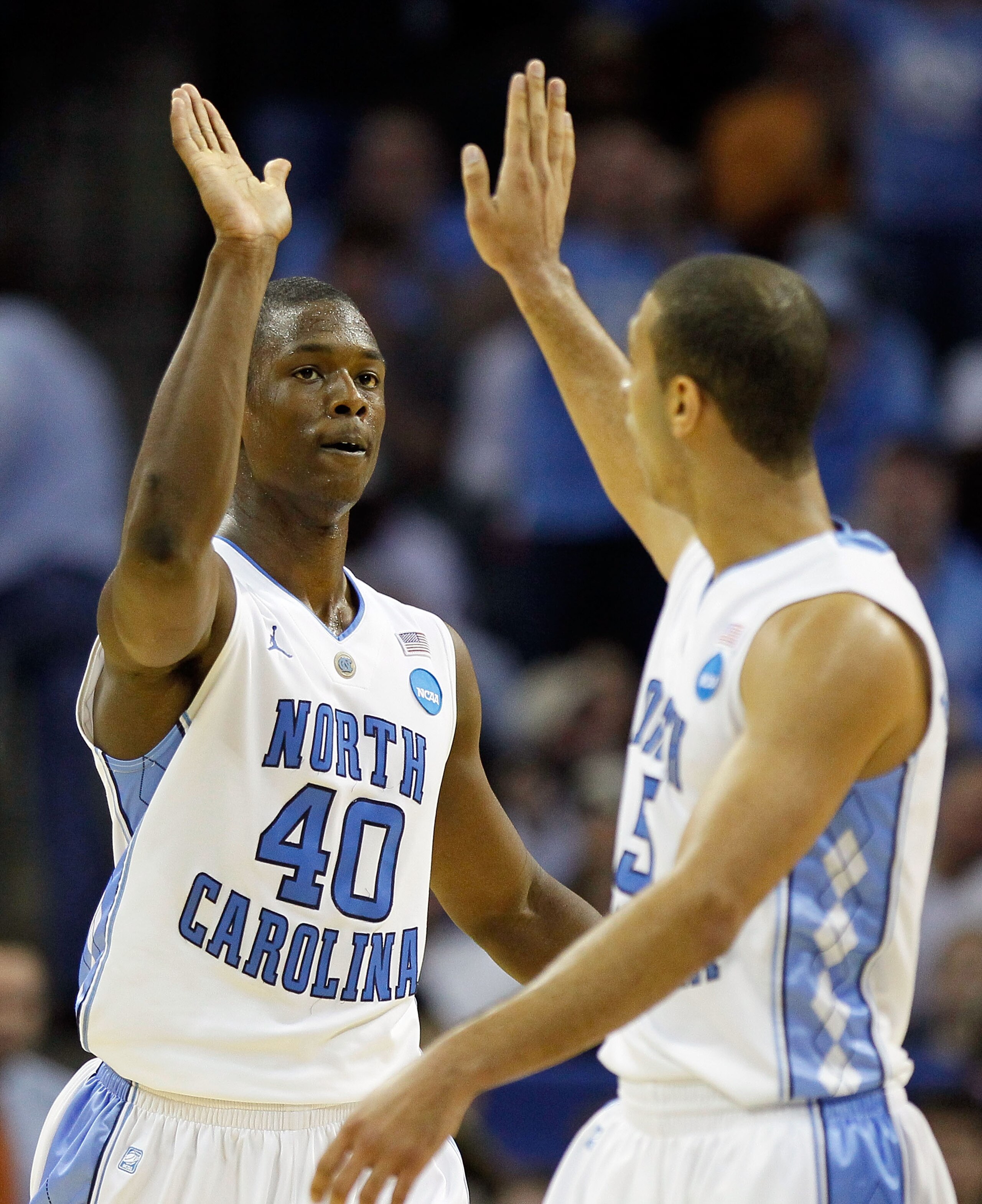 CHARLOTTE, NC - MARCH 20:  Harrison Barnes #40 and Kendall Marshall #5 of the North Carolina Tar Heels react in the second half while taking on the Washington Huskies during the third round of the 2011 NCAA men's basketball tournament at Time Warner Cable