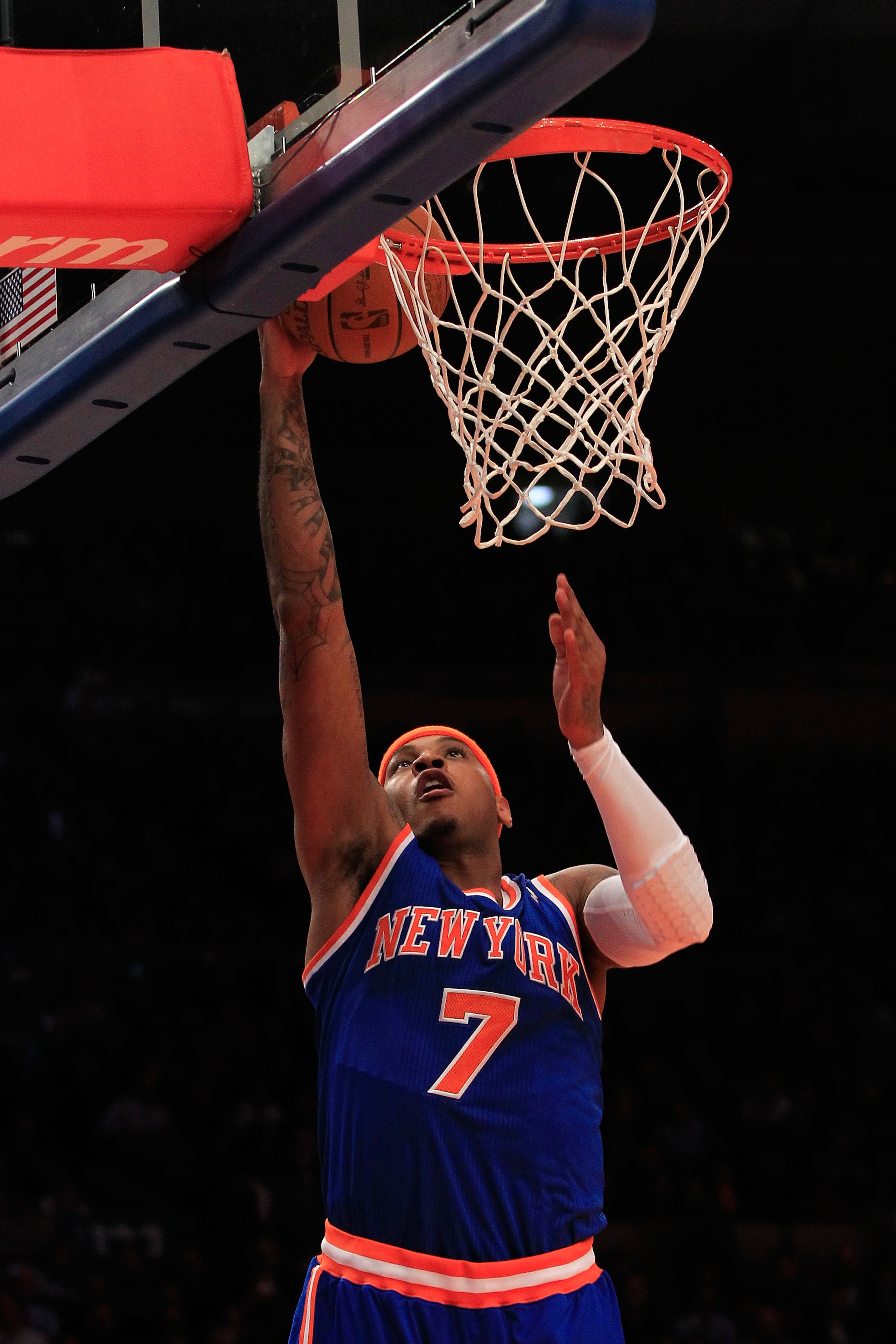 NEW YORK, NY - FEBRUARY 23:  Carmelo Anthony #7 of the New York Knicks lays the ball up against the Milwaukee Bucks at Madison Square Garden on February 23, 2011 in New York City. NOTE TO USER: User expressly acknowledges and agrees that, by downloading a
