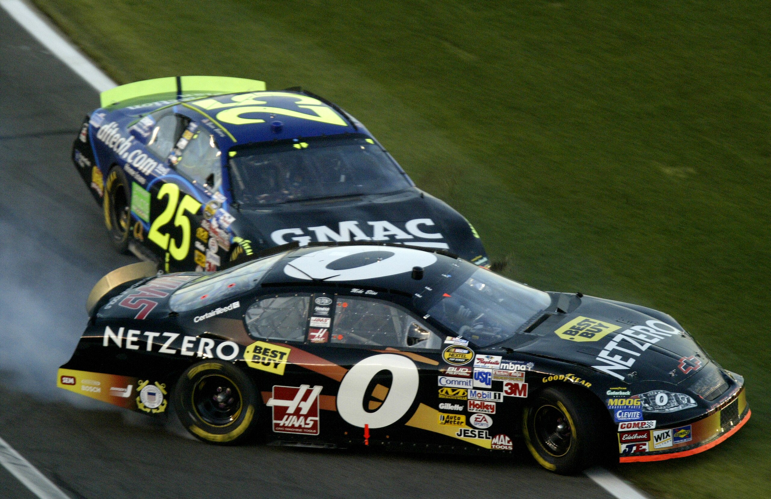 CONCORD, NC - MAY 21:  Mike Bliss, driver of the #0 NetZero Chevrolet, is spun out on the final lap by Brian Vickers, driver of the #25 GMAC/ditech.com Chevrolet, during the NASCAR Nextel Cup All-Star Open at Lowe's Motor Speedway on May 21, 2005 in Conco