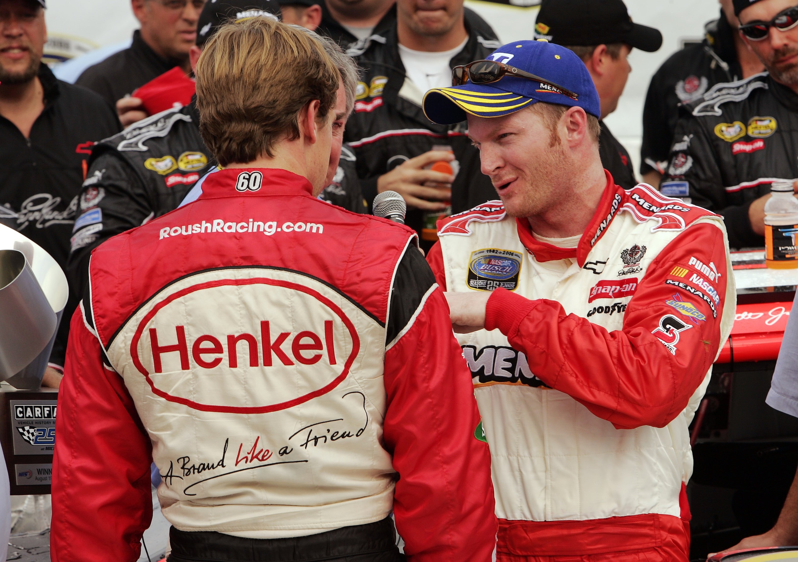 BROOKLYN, MI - AUGUST 19:  Dale Earnhardt Jr.(R), driver of the #8 Menards/Johns Manville Chevrolet, talks with Carl Edwards, driver of the #60 Henkel Ford, in victory lane after an on track collision during the NASCAR Busch Series CARFAX 250 on August 19