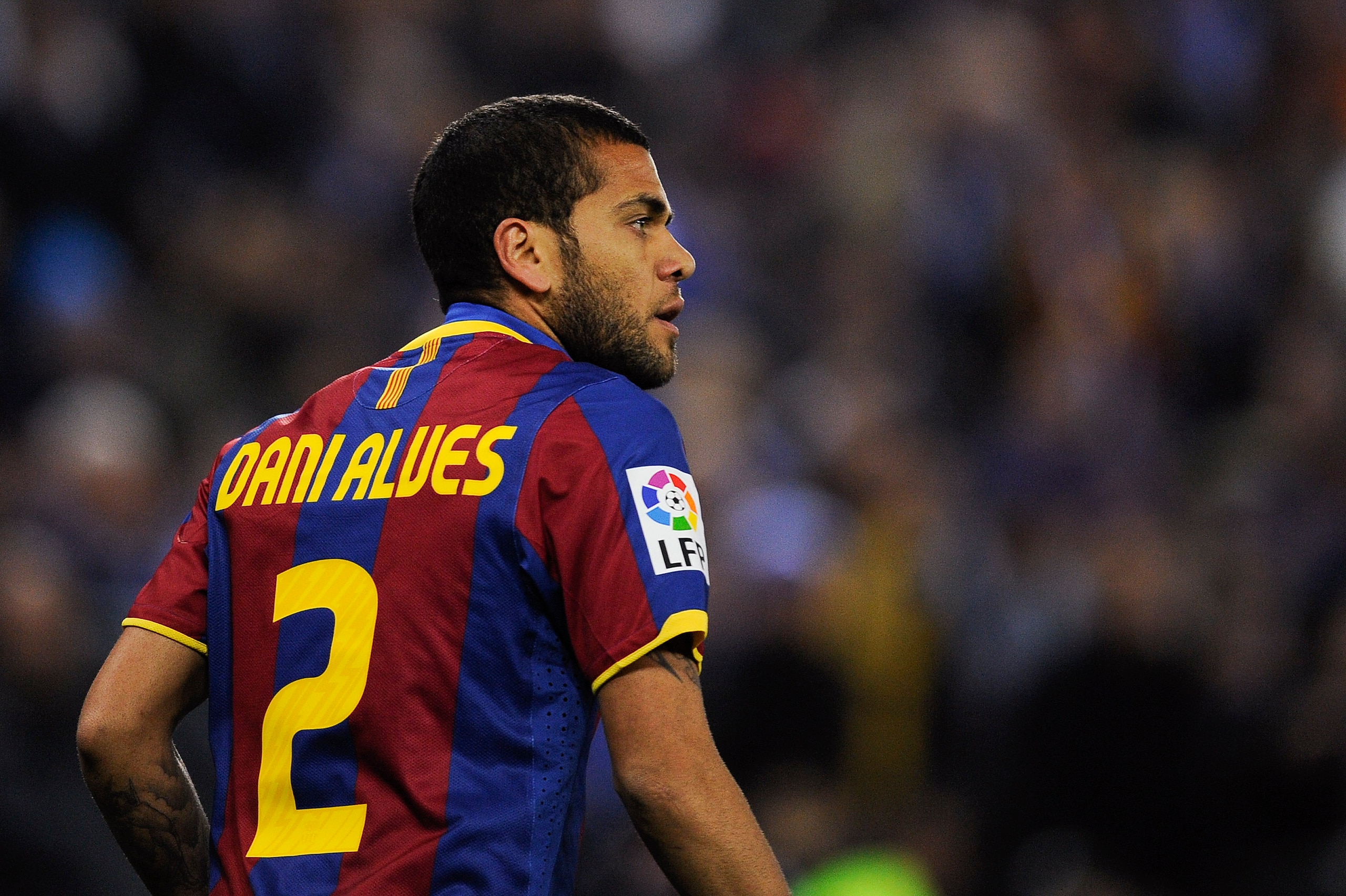 BARCELONA, SPAIN - DECEMBER 18:  Dani Alves of Barcelona looks on during the La Liga match between Espanyol and Barcelona at Cornella - El Prat stadium on December 18, 2010 in Barcelona, Spain. Barcelona won the match 1-5.  (Photo by David Ramos/Getty Ima