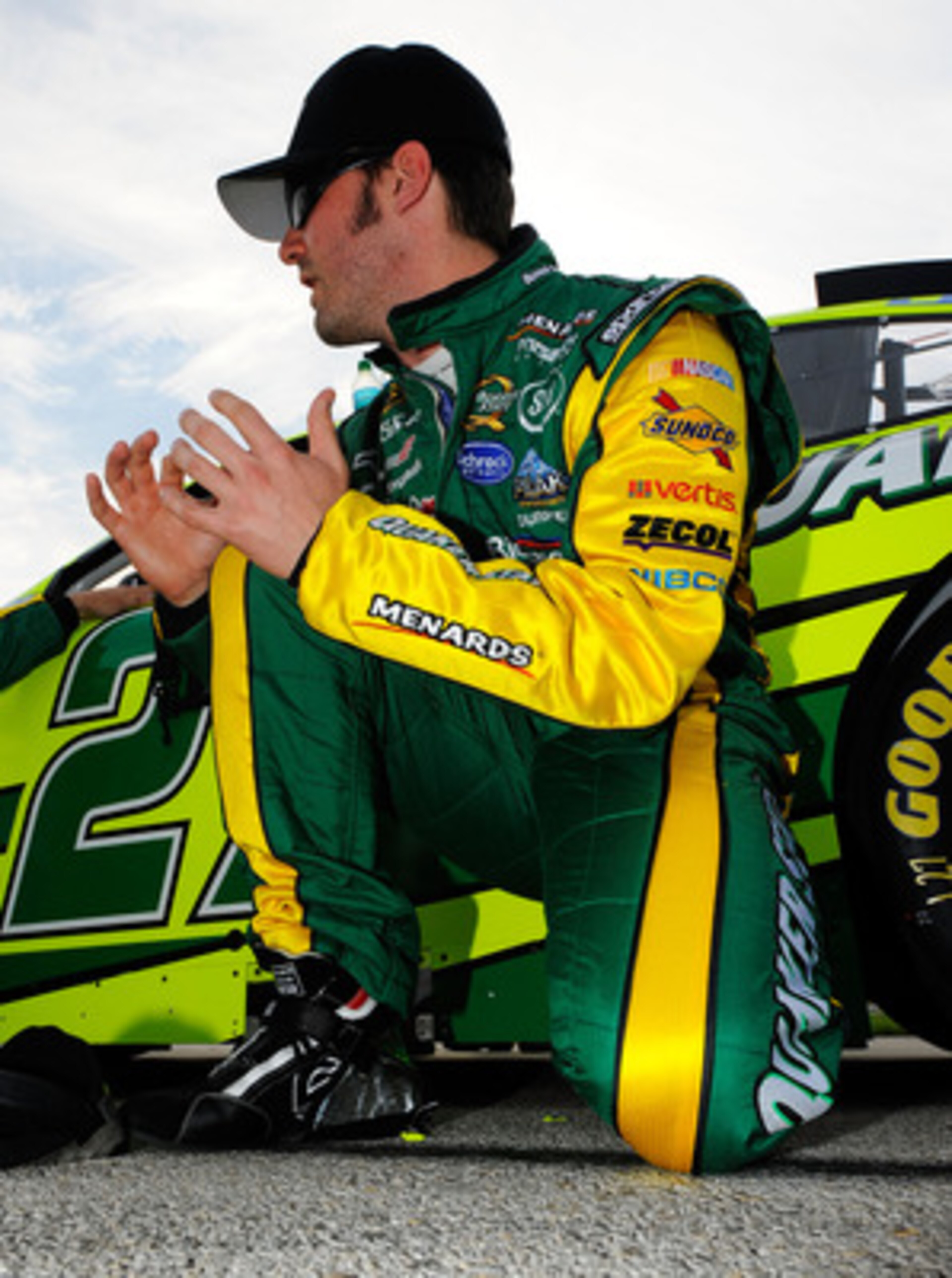 FORT WORTH, TX - APRIL 09:  Paul Menard, driver of the #27 Quaker State/Menards Chevrolet, kneels on the grid prior to the start of the NASCAR Sprint Cup Series Samsung Mobile 500 at Texas Motor Speedway on April 9, 2011 in Fort Worth, Texas.  (Photo by J