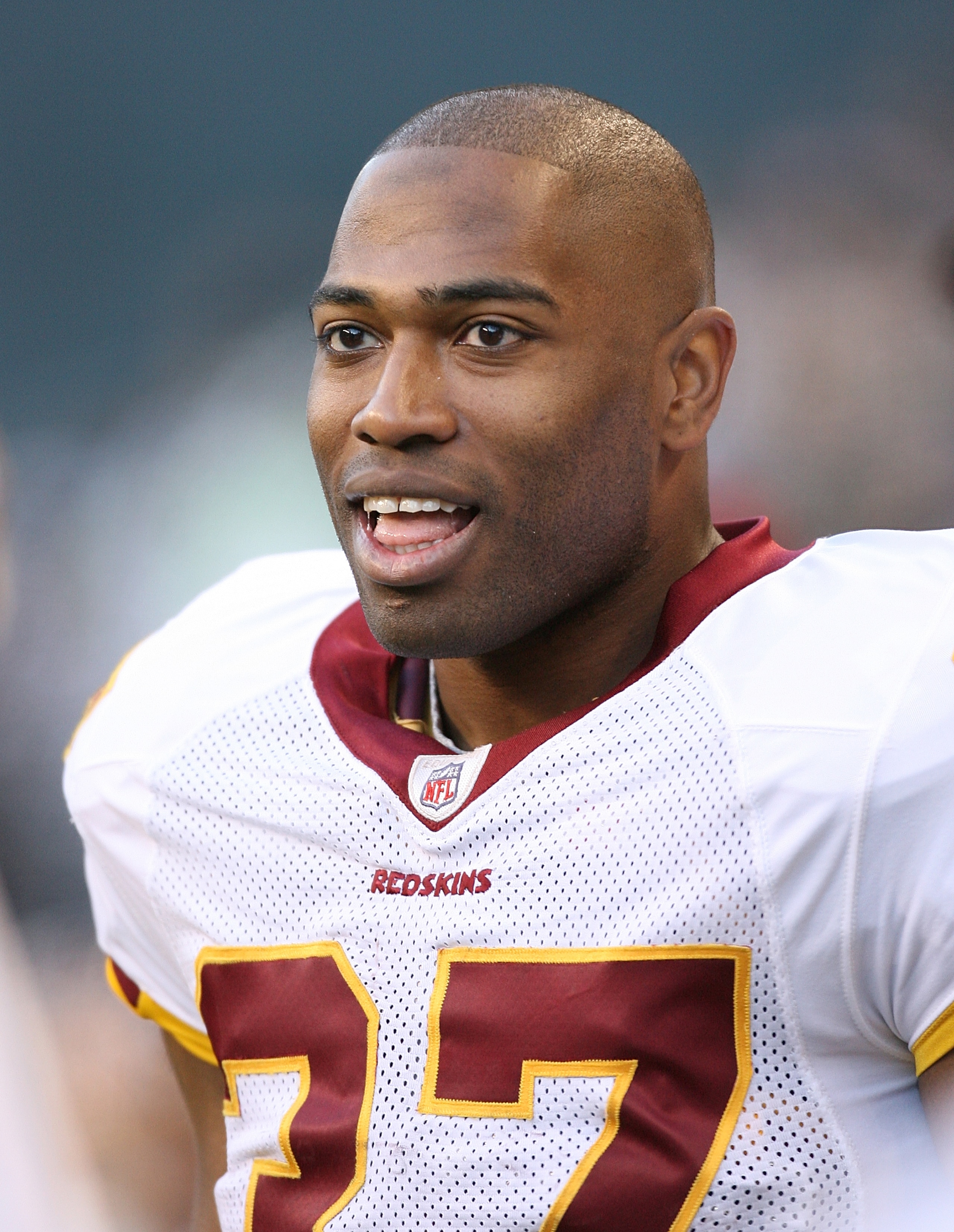 SEATTLE - NOVEMBER 23: Running back Shaun Alexander #37 of the Washington Redskins smiles on the sidelines during the game against the Seattle Seahawks on November 23, 2008 at Qwest Field in Seattle, Washington. The Redskins defeated the Seahawks 20-17. SEATTLE - NOVEMBER 23: Running back Shaun Alexander #37 of the Washington Redskins smiles on the sidelines during the game against the Seattle Seahawks on November 23, 2008 at Qwest Field in Seattle, Washington. The Redskins defeated the Seahawks 20-17.