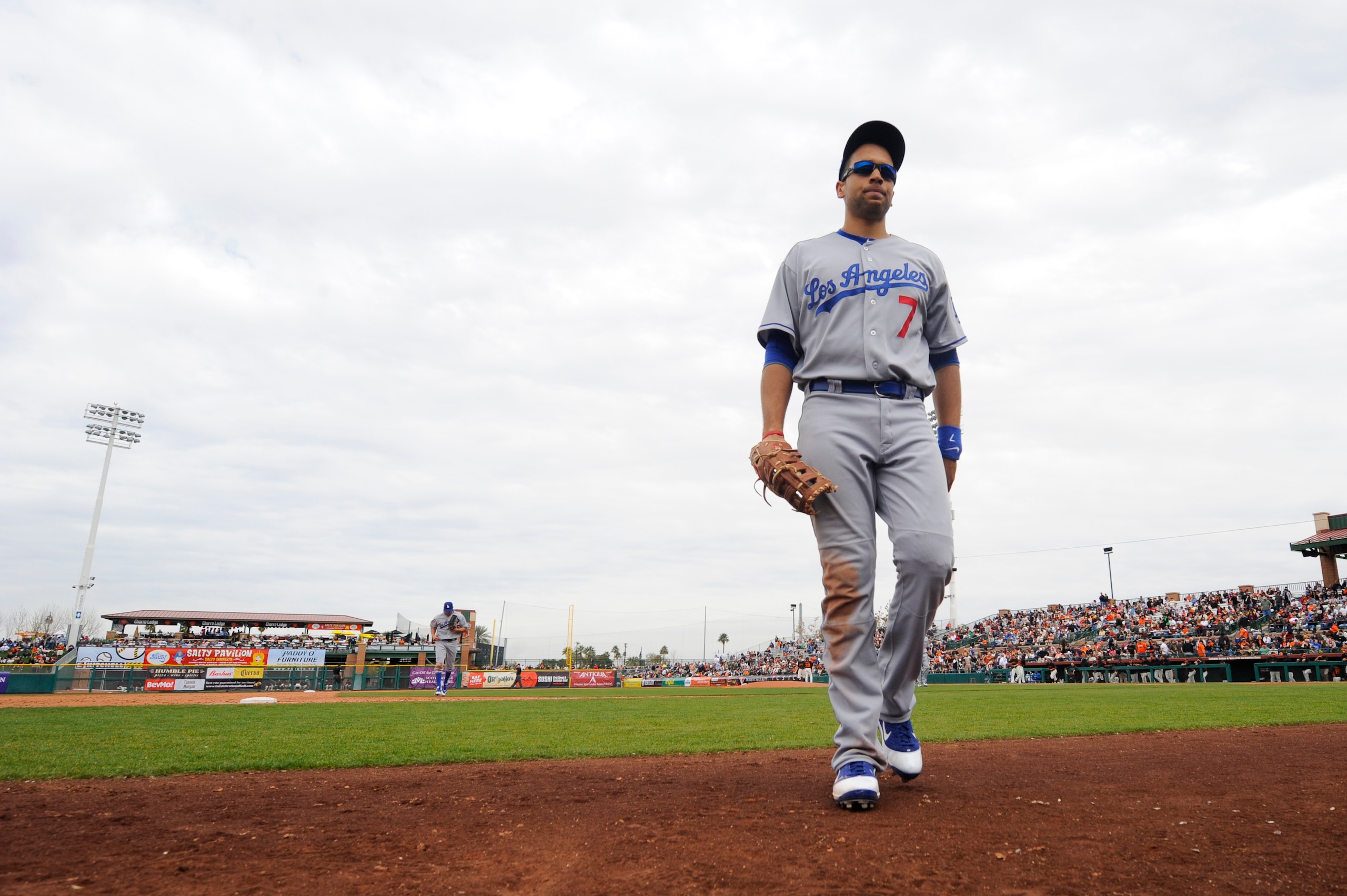 SCOTTSDALE, AZ - FEBRUARY 26: James Loney #7 of the Los Angeles Dodgers walks back to the dugout between innngs during a spring training game against the San Francisco Giants at Scottsdale Stadium on February 26, 2011 in Scottsdale, Arizona. (Photo by Rob