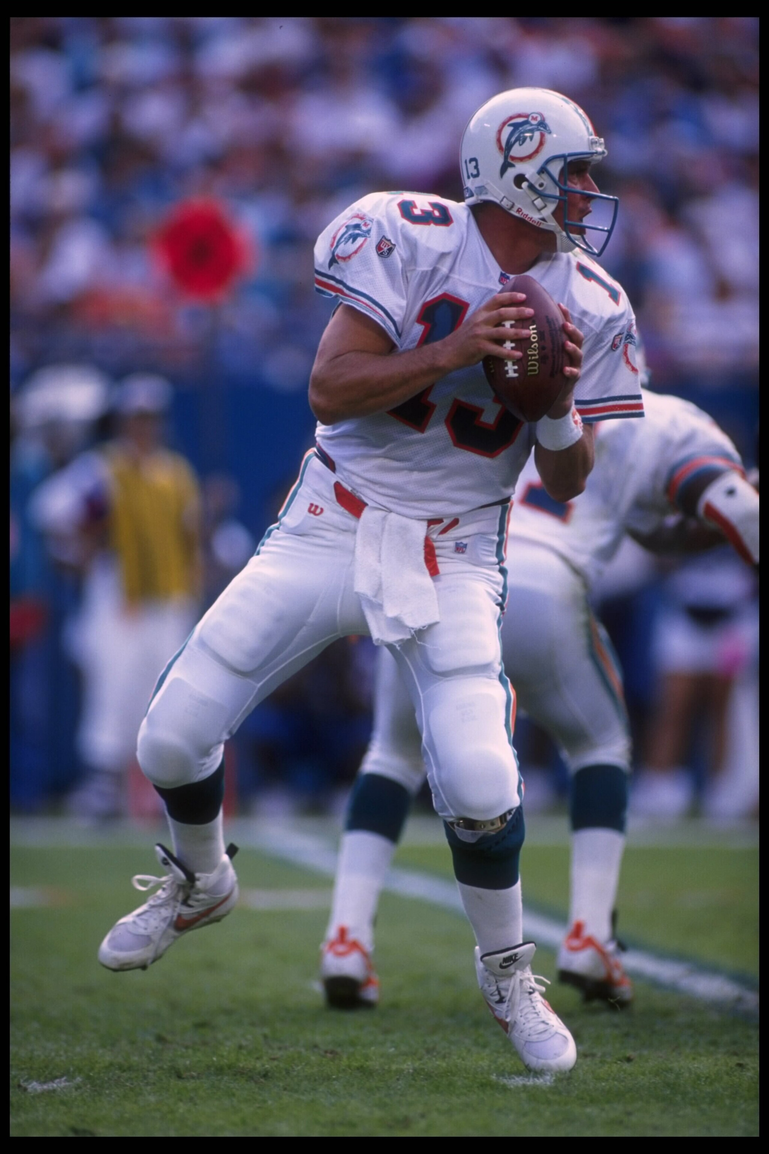 3 Dec 1995:  Quarterback Dan Marino #13 of the Miami Dolphins drops back to pass downfield against the Atlanta Falcons at Joe Robbie Stadium in Miami, Florida.  The Dolphins edged out the Falcons 21-20.  Mandatory Credit:  Scott Halleran/Allsport