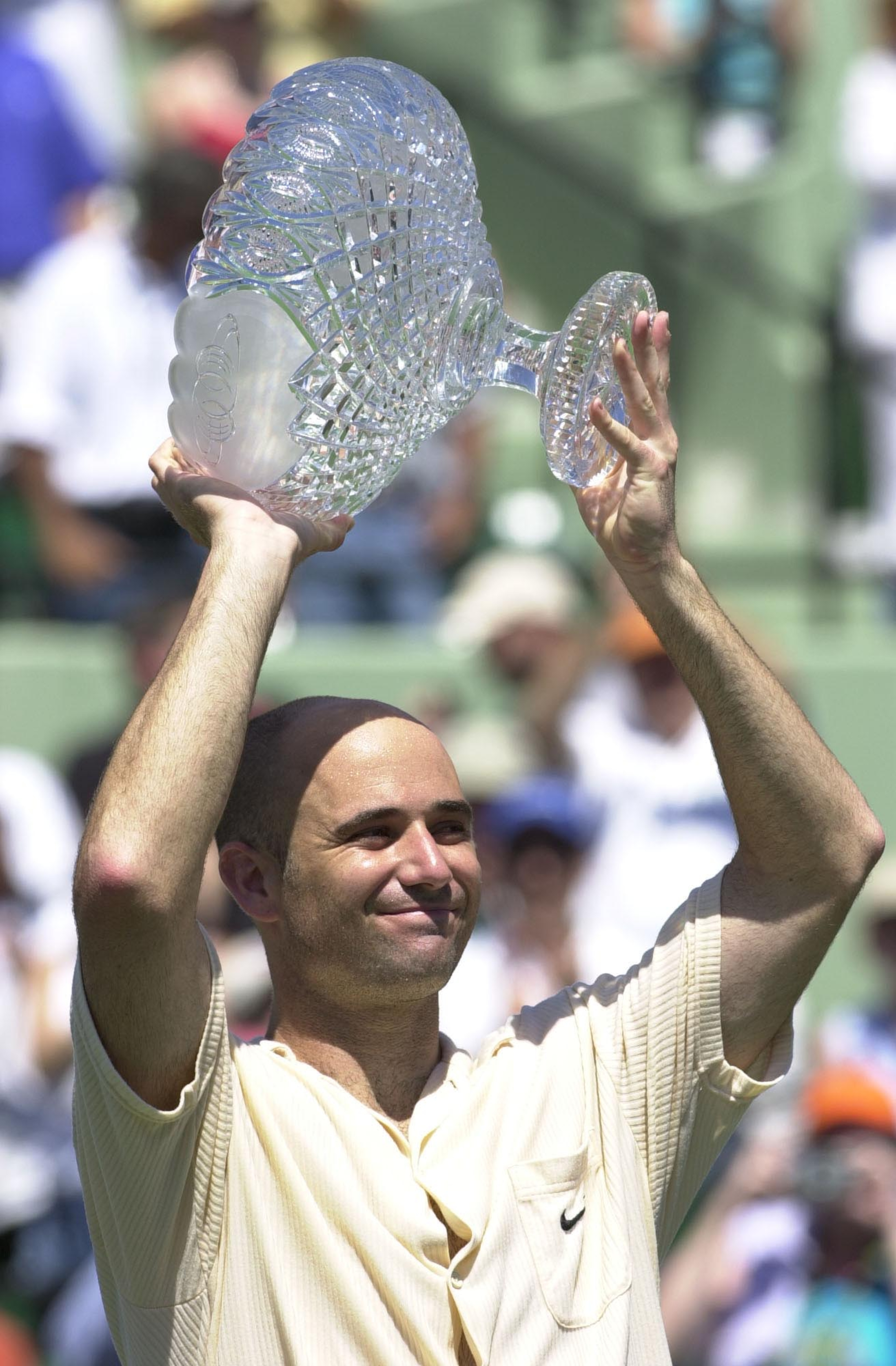 1 Apr 2001: Andre Agassi celebrates his victory over Jan-Michael Gambill during the finals of the Ericsson Open at the Tennis Center at Crandon Park in Miami, Florida. Agassi won 7-6 (6-3), 6-1, 6-0.<DIGITAL IMAGE> Mandatory Credit: Clive Brunskill/ALLSPO