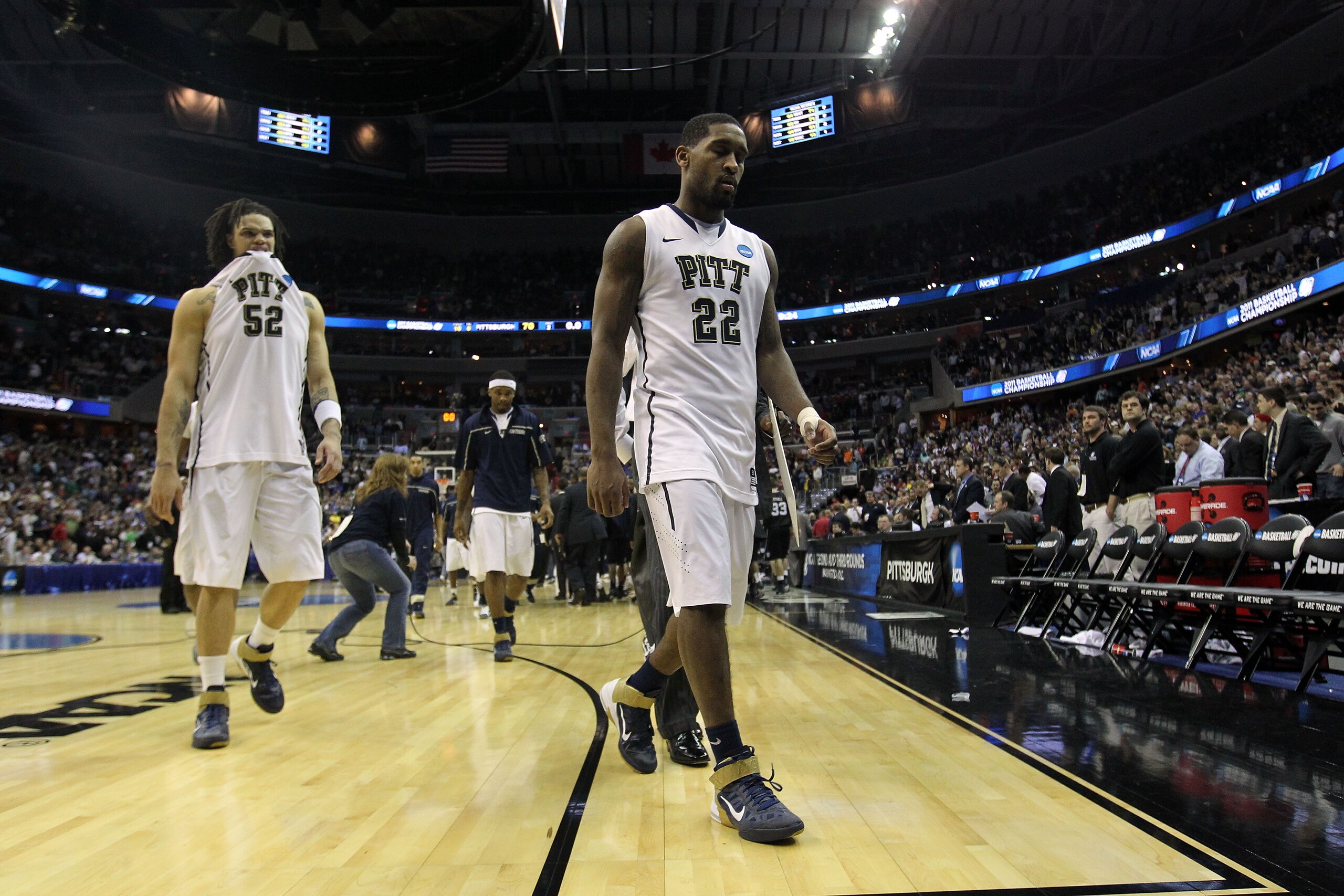 WASHINGTON - MARCH 19:  Gary McGhee #52 and Brad Wanamaker #22 of the Pittsburgh Panthers walk off the court after their loss to the Butler Bulldogs during the third round of the 2011 NCAA men's basketball tournament at Verizon Center on March 19, 2011 in