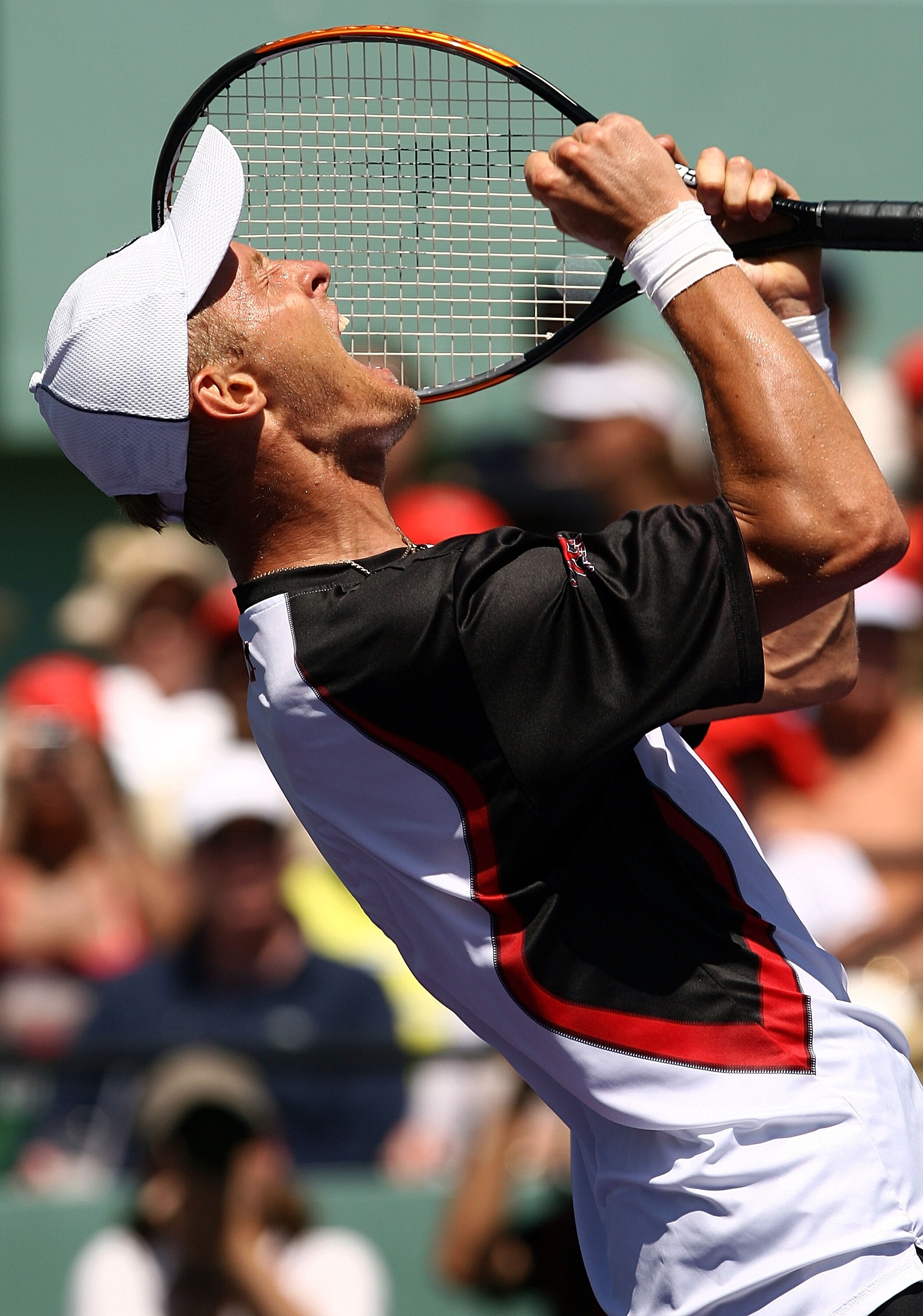 KEY BISCAYNE, FL - APRIL 06:  Nikolay Davydenko of Russia celebrates after defeating Rafael Nadal of Spain in straight sets to win the men's singles final on day fourteen of the Sony Ericsson Open at the Crandon Park Tennis Center on April 6, 2008 in Key