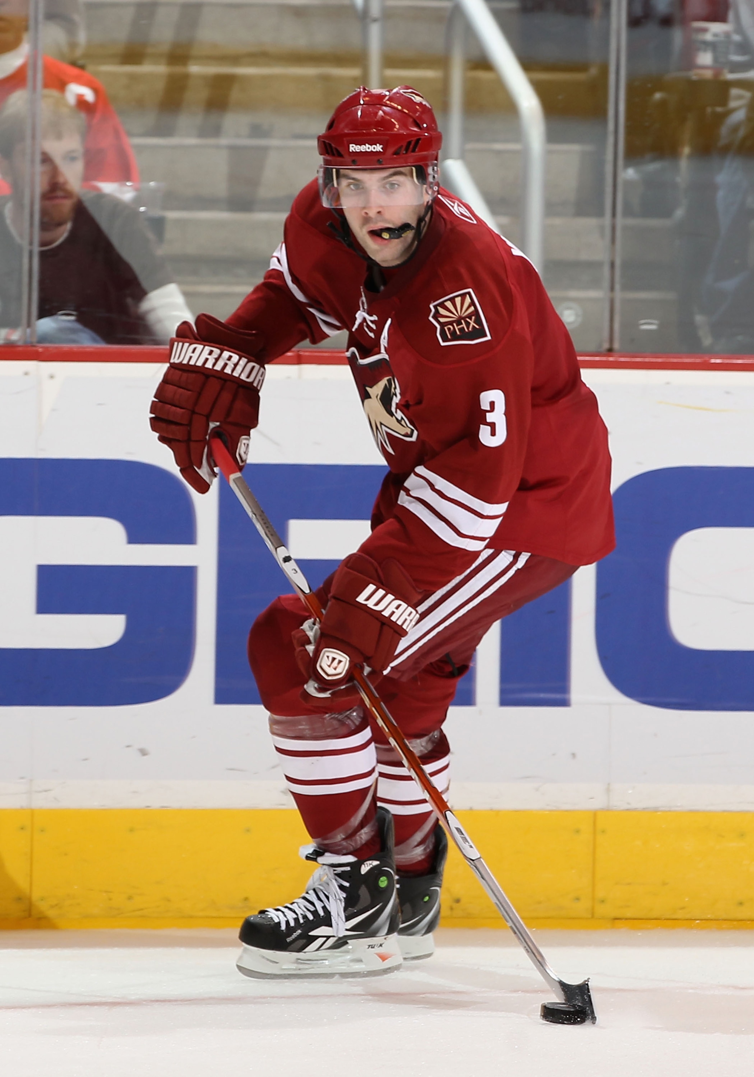 GLENDALE, AZ - MARCH 05:  Keith Yandle #3 of the Phoenix Coyotes skates with the puck during the NHL game against the Detroit Red Wings at Jobing.com Arena on March 5, 2011 in Glendale, Arizona. The Coyotes defeated the Red Wings 5-4 in an overtime shoot