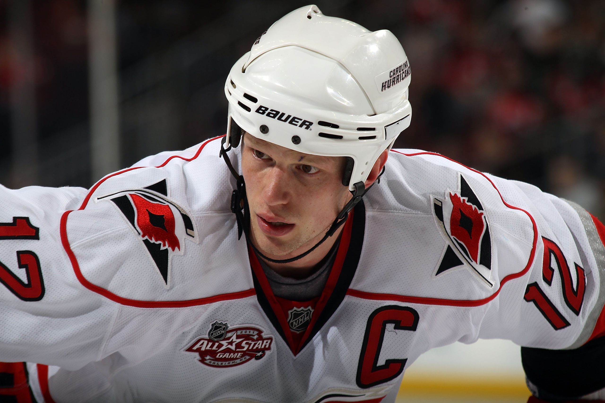 NEWARK, NJ - FEBRUARY 16:  Eric Staal #12 of the Carolina Hurricanes skates against the New Jersey Devils at the Prudential Center on February 16, 2011 in Newark, New Jersey.  (Photo by Bruce Bennett/Getty Images)